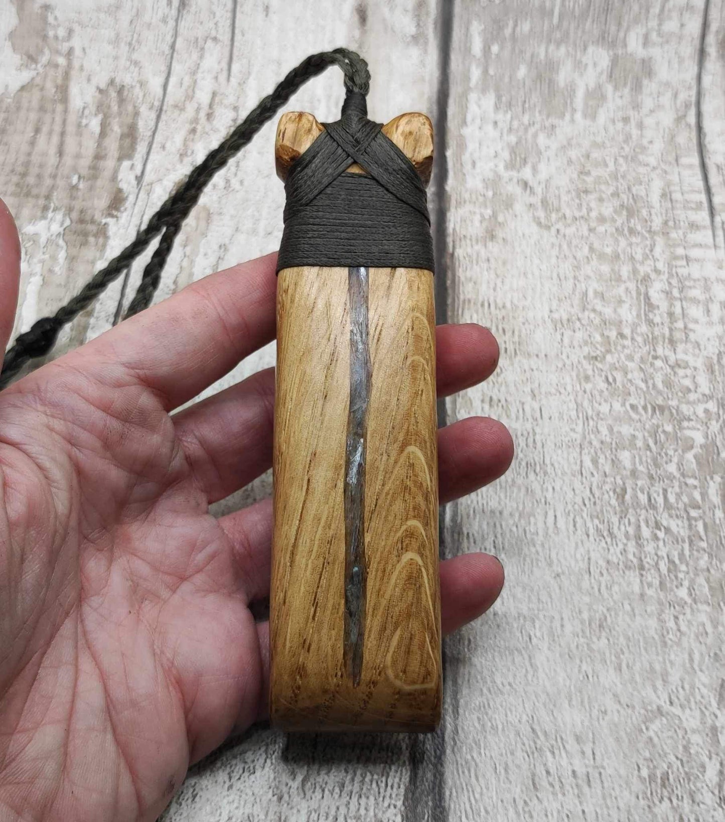 Oak wood statement Hei Toki adze pendant with blue kyanite inlay.