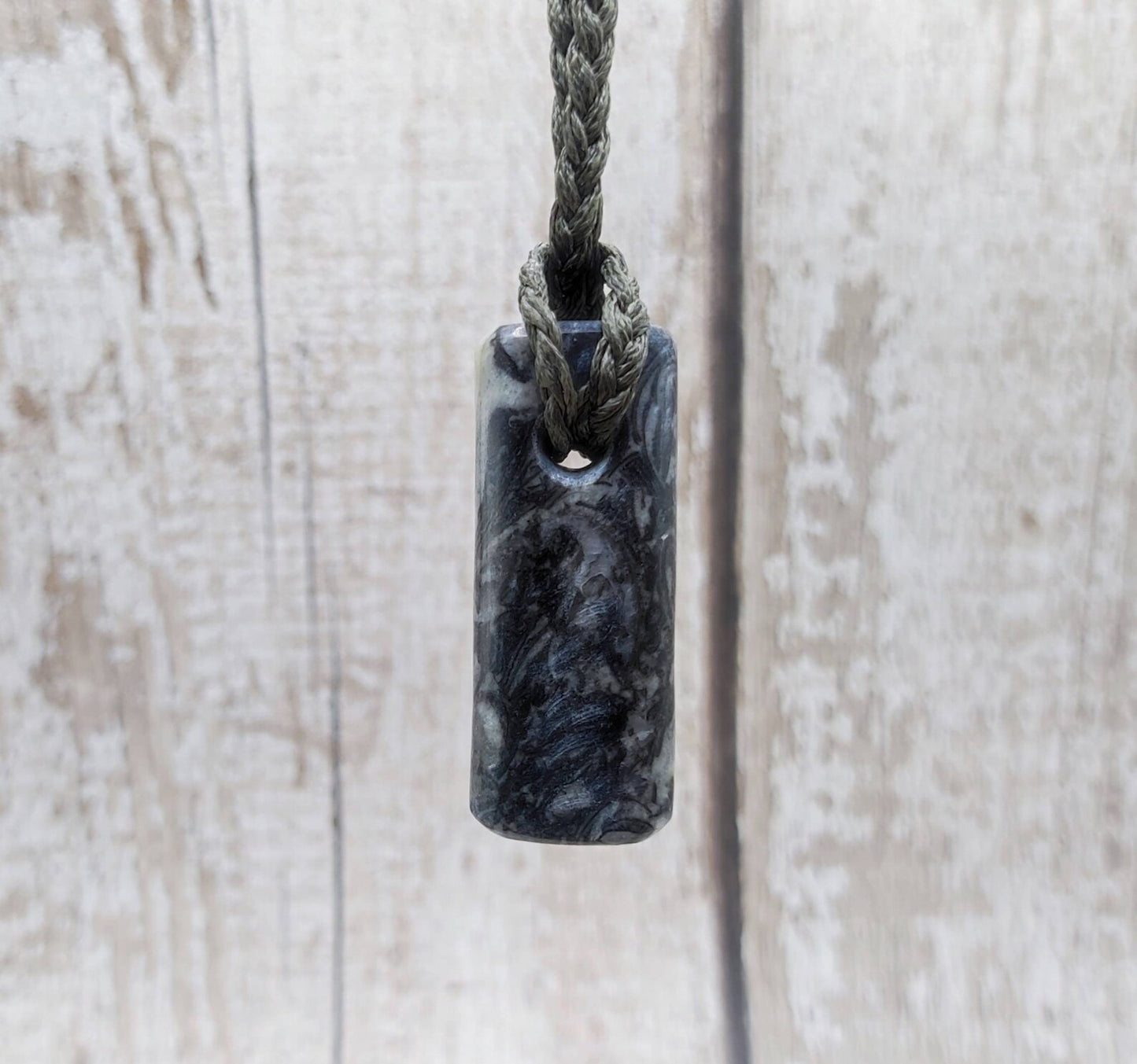 Fossil bedrock Hei Toki adze pendant