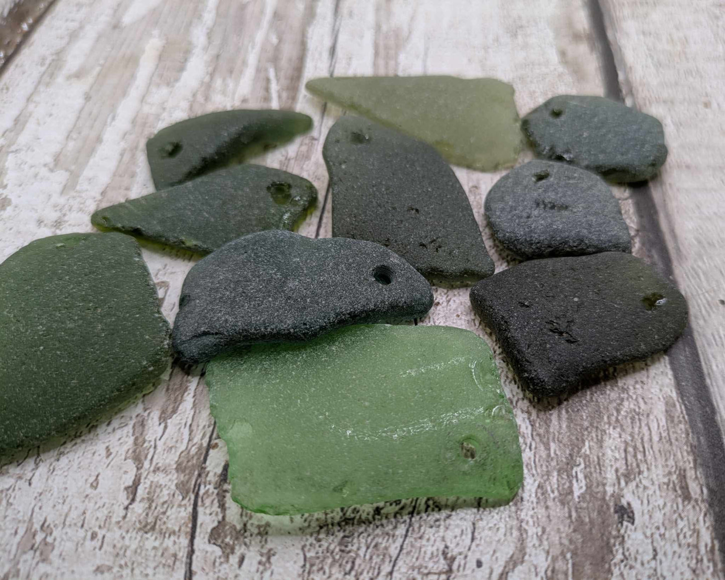 Green sea glass top drilled beads.