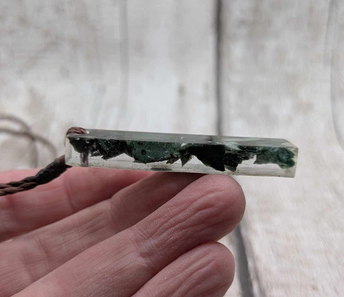 New Zealand mixed Pounamu chip pendant in UV resin.