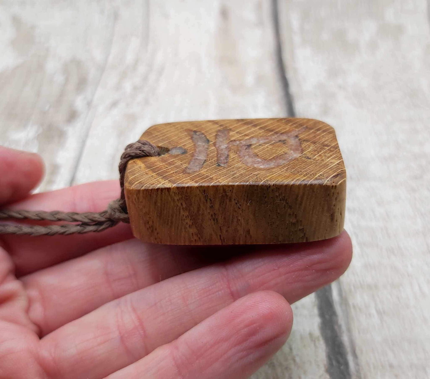 Oak wood sacral chakra and sunstone inlay.