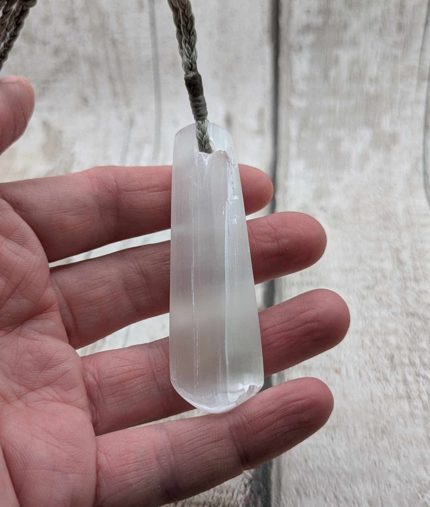 Selenite satin spar roimata pendant.