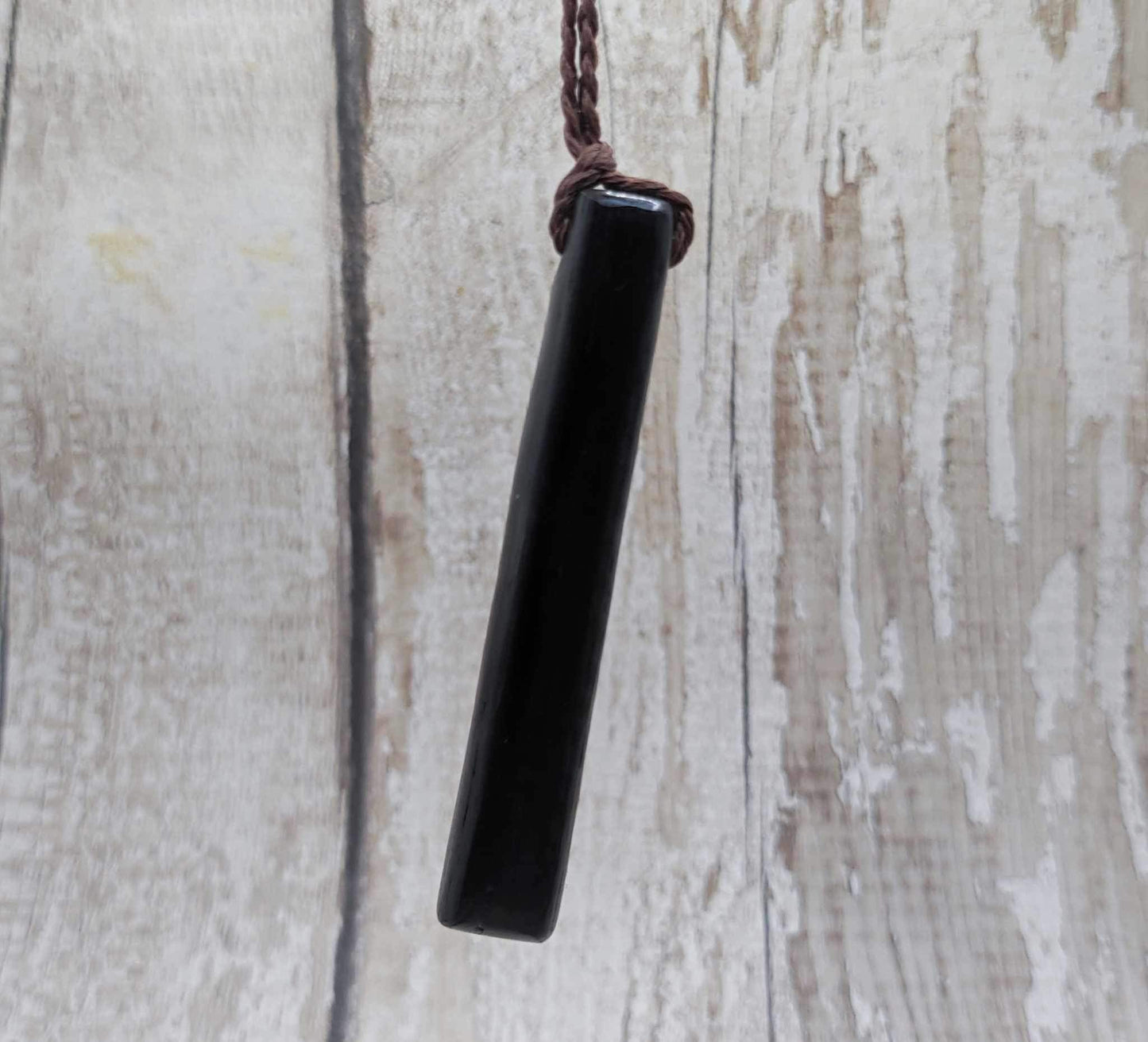 Bog oak + moldavite roimata carved pendant.
