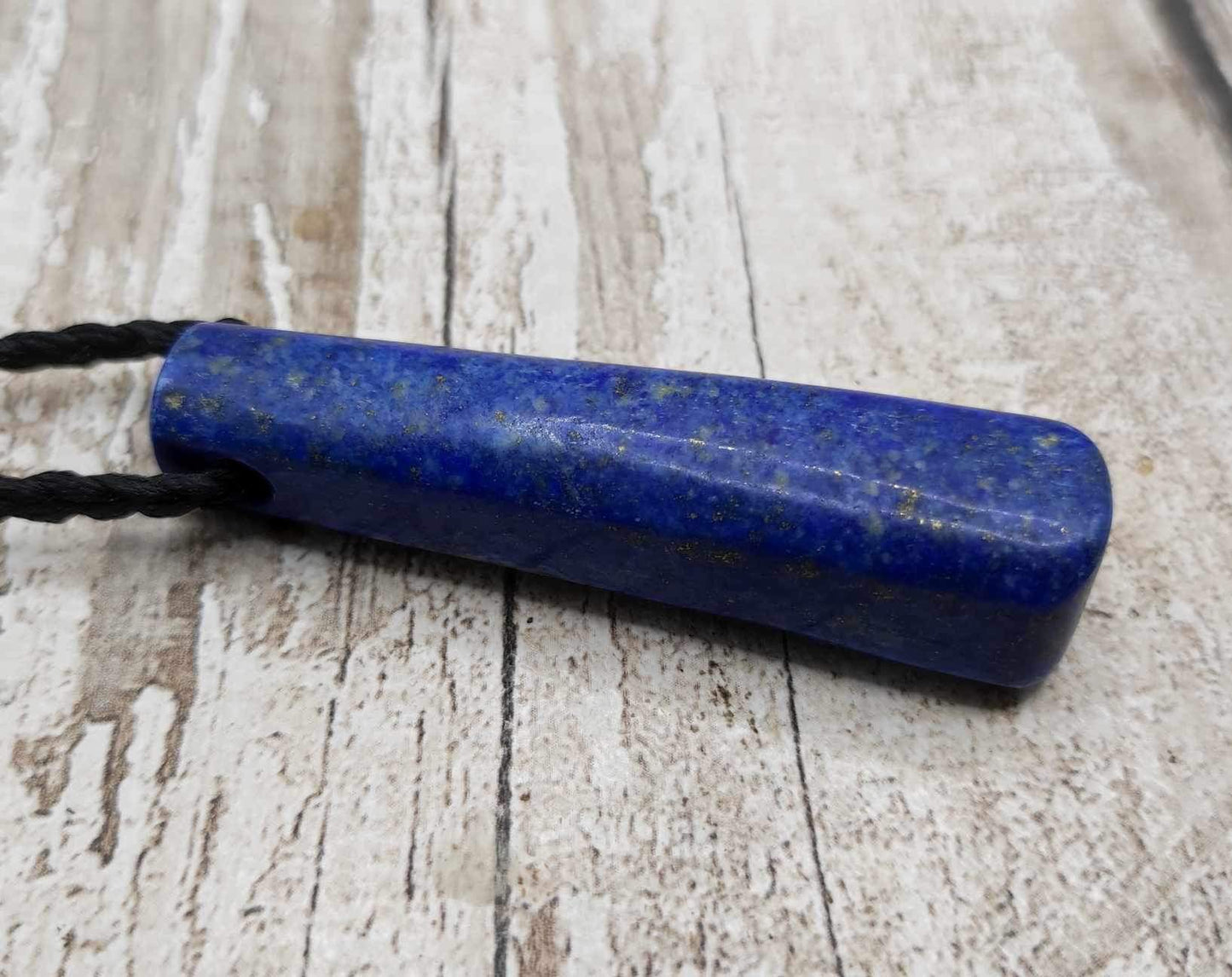 Lapis lazuli roimata drop stone pendant.