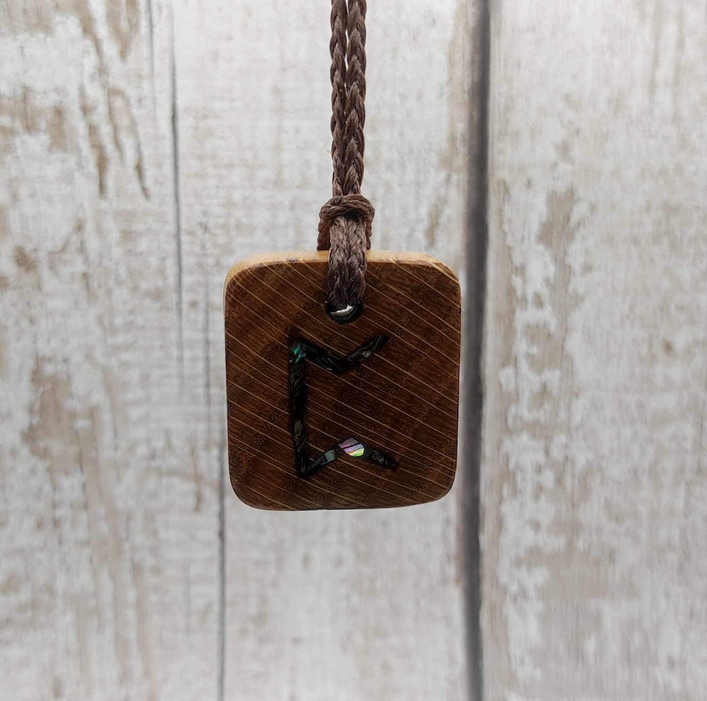 Perthro oak wood rune Christmas decoration with Pāua shell inlay.
