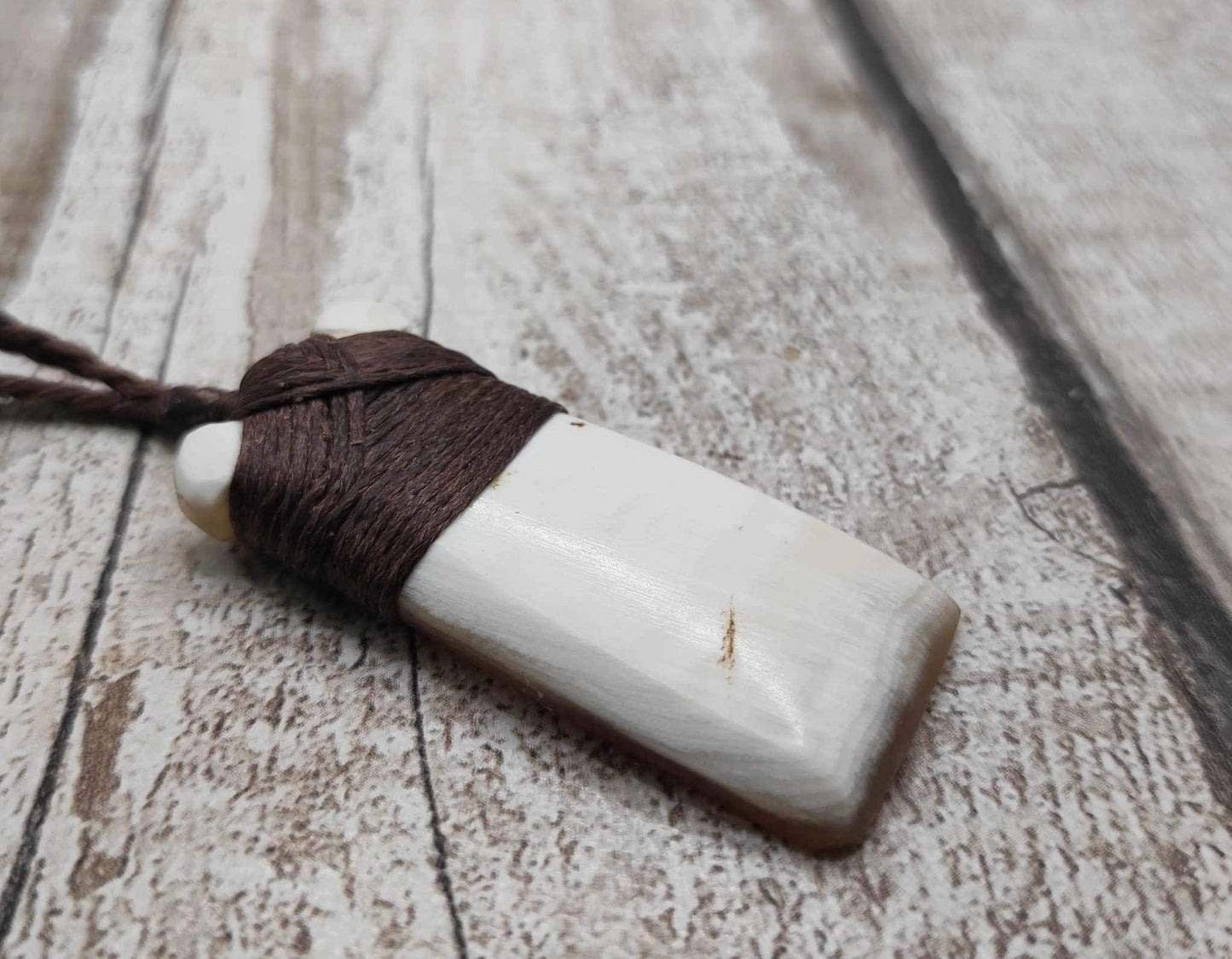 Cow horn Hei Toki adze unisex pendant.