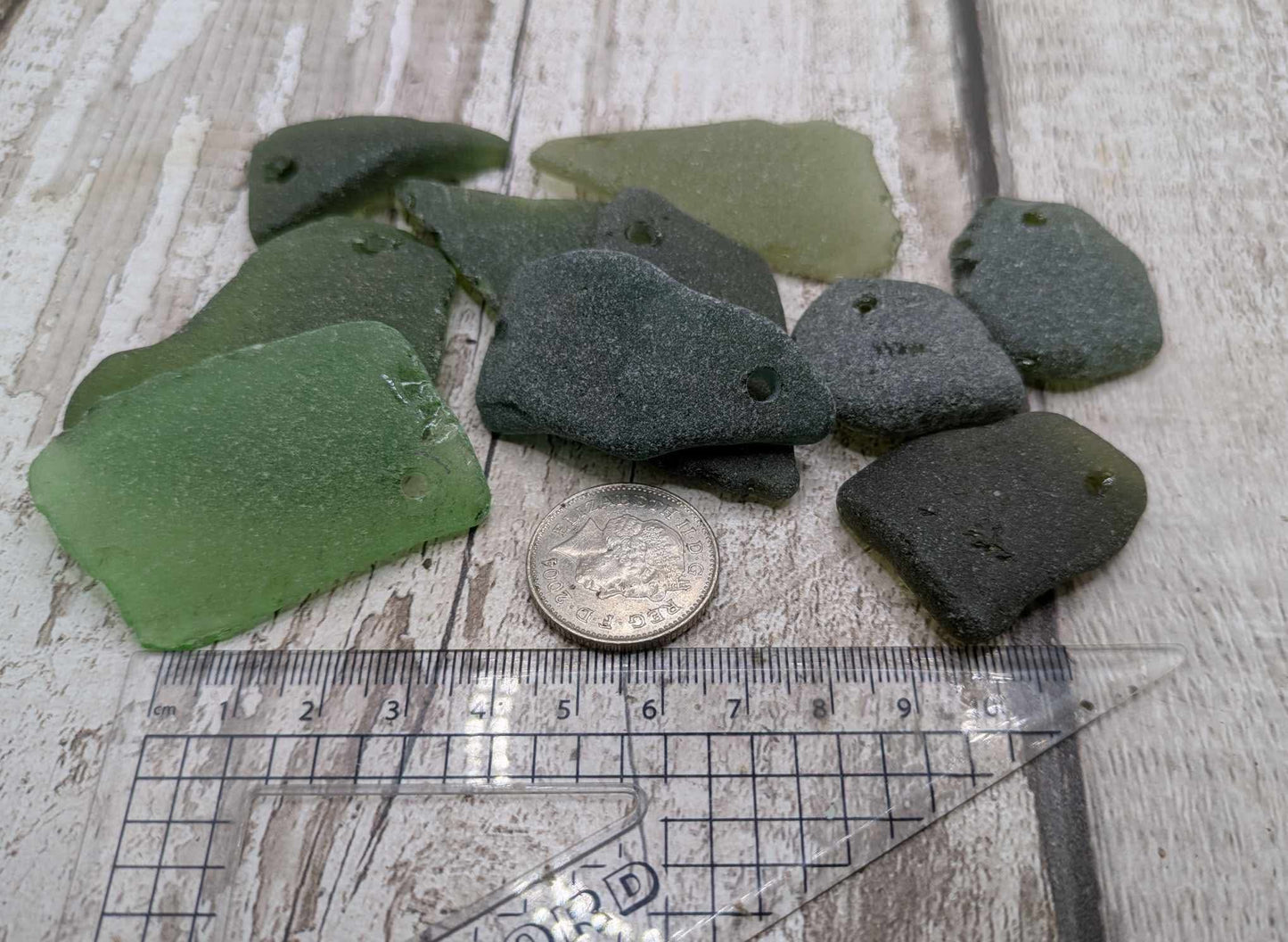 Green sea glass top drilled beads.