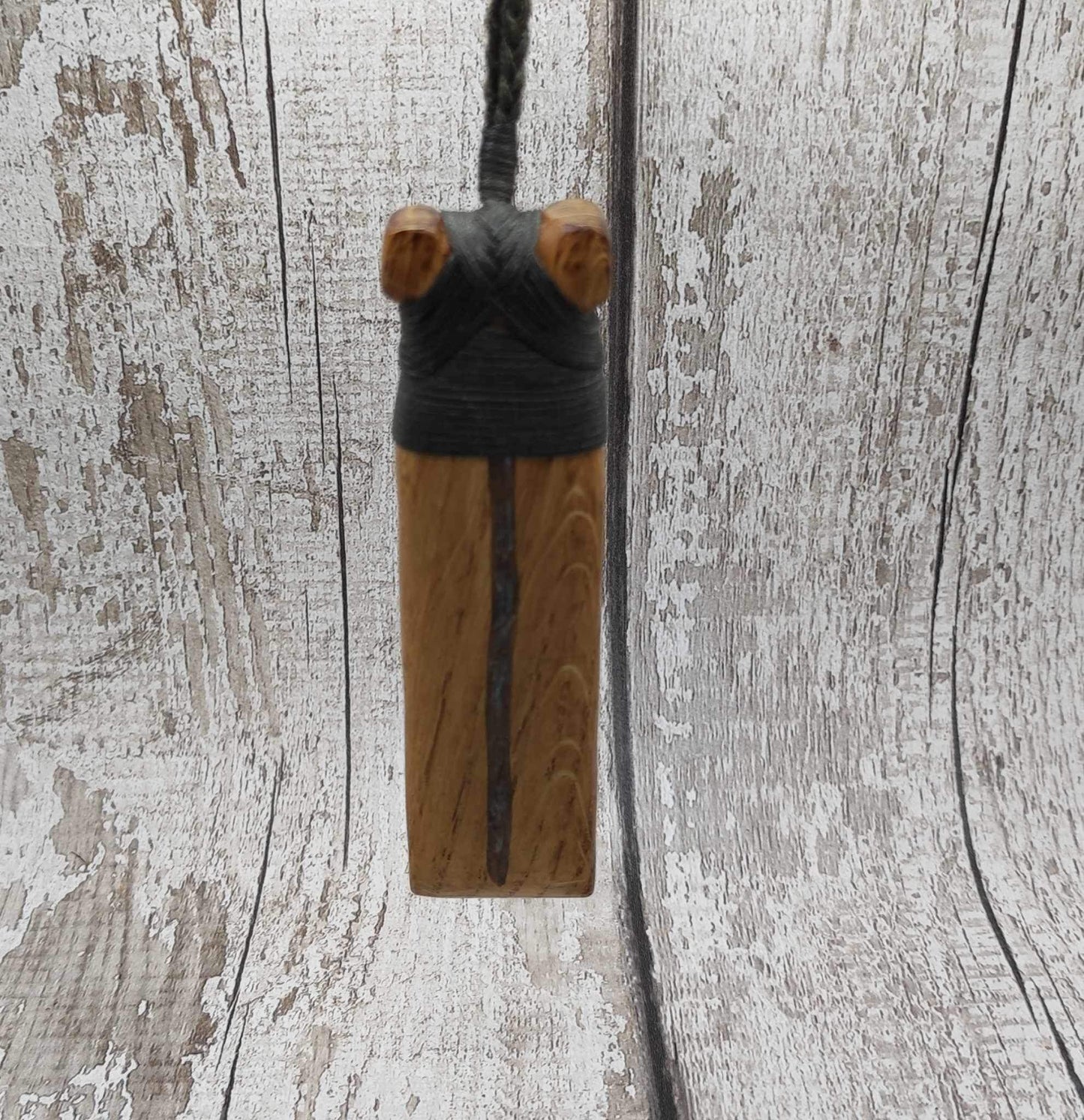 Oak wood statement Hei Toki adze pendant with blue kyanite inlay.