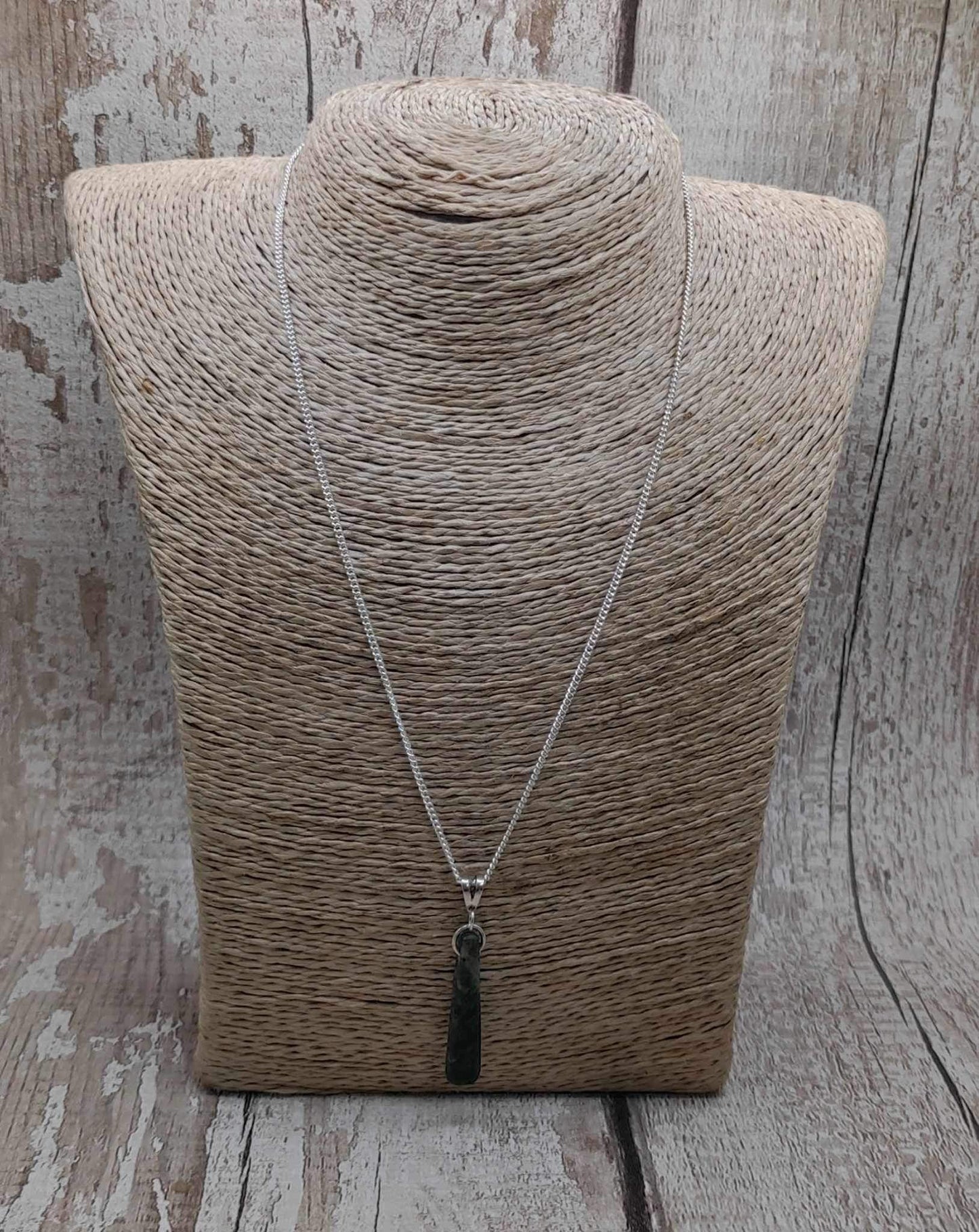 New Zealand Pounamu Greenstone serpentine, roimata drop on silver pendant.