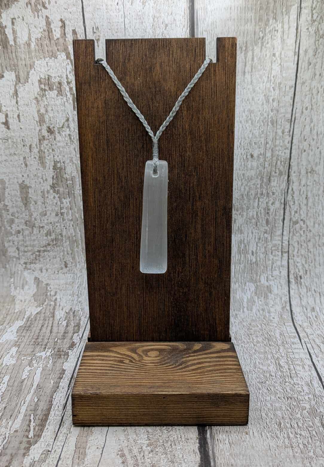 Selenite satin spar Toki pendant.