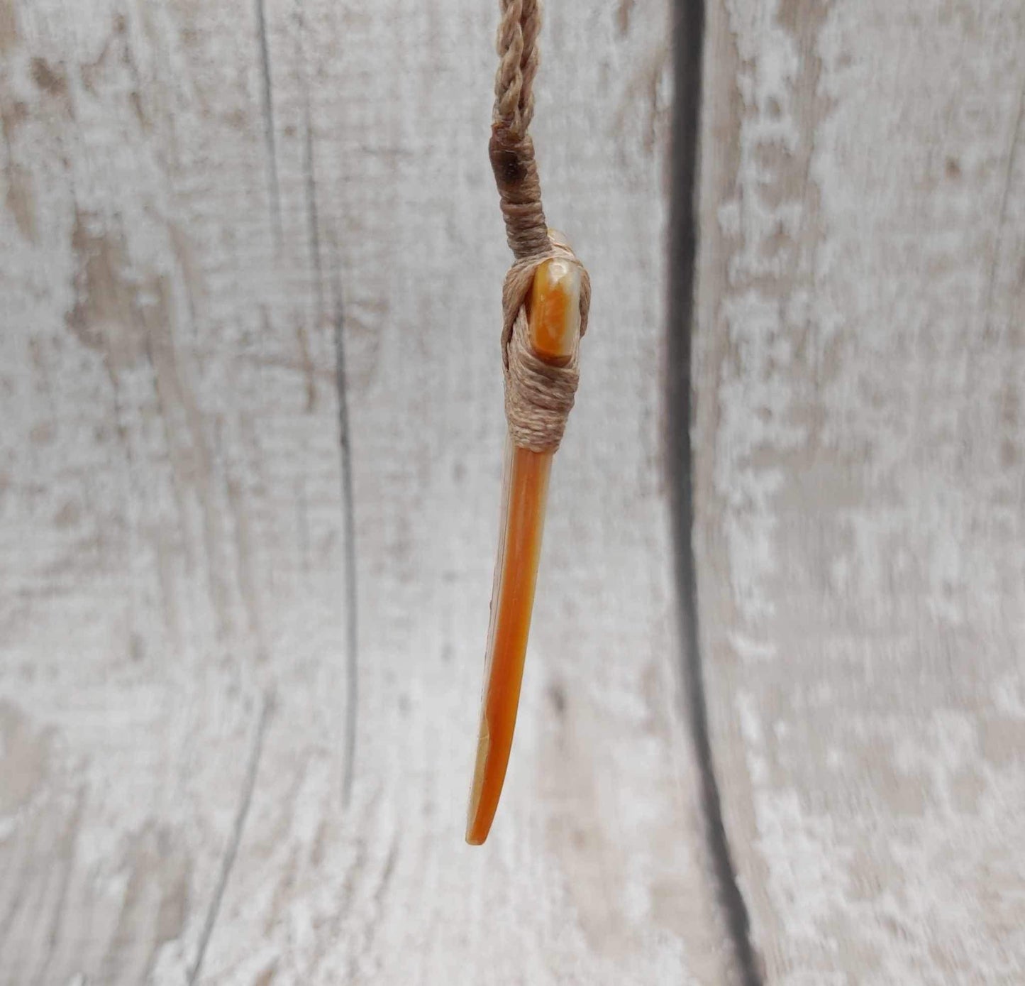 Mother of Pearl Hei Toki adze pendant.