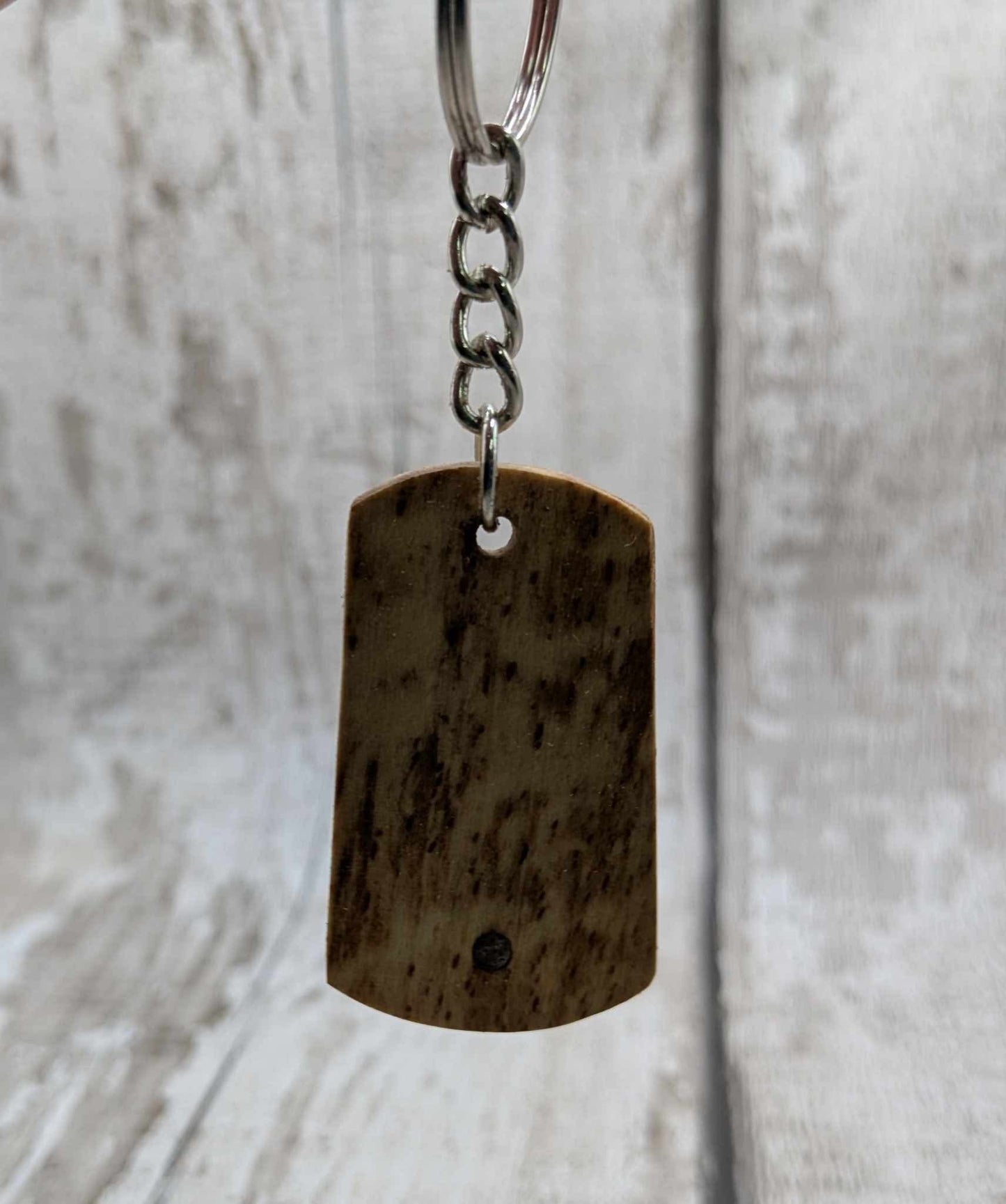 Beech wood keyrings and blue kyanite inlay.