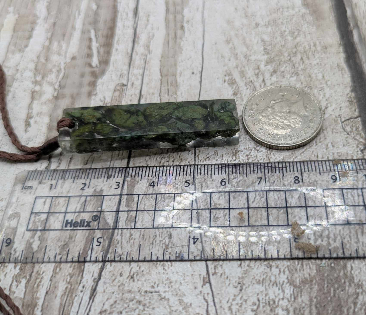 New Zealand mixed Pounamu greenstone chip pendant in UV resin.