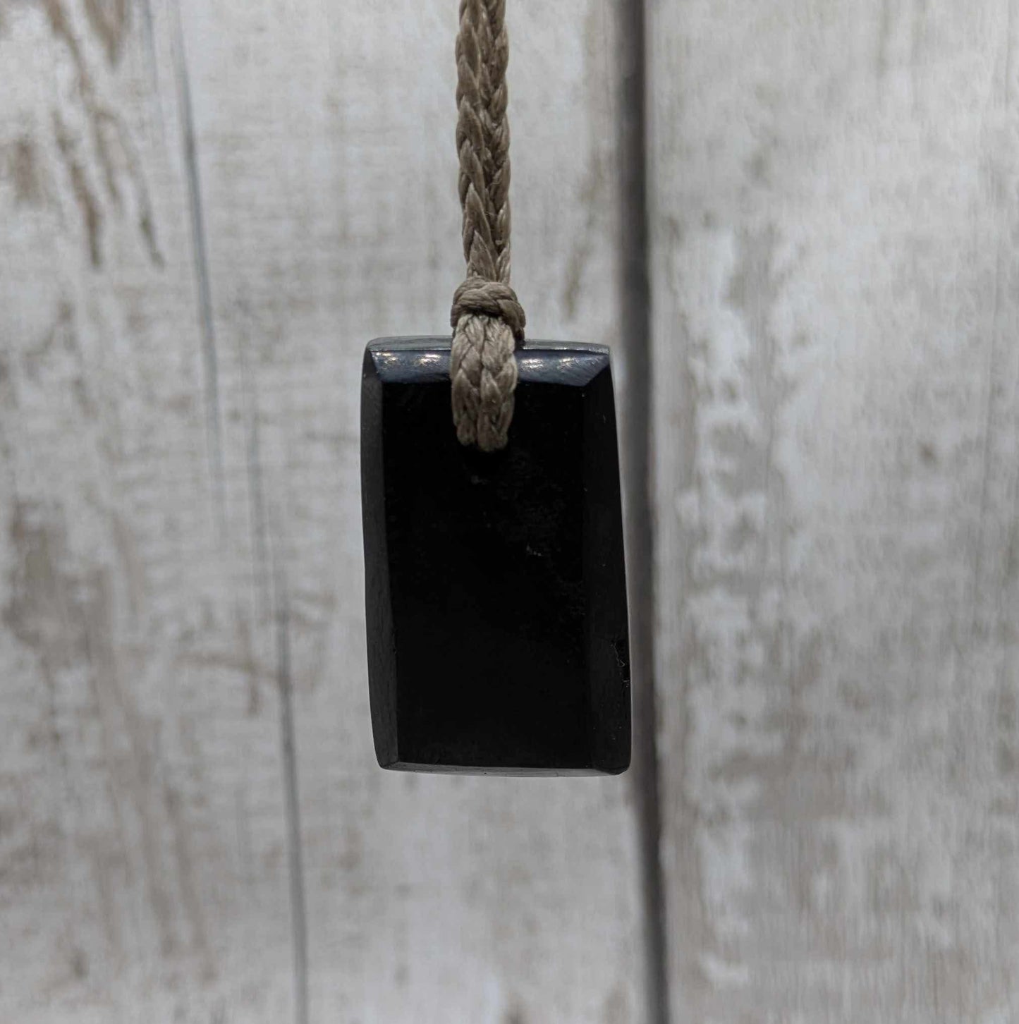 Sea coal rectangular pendant.