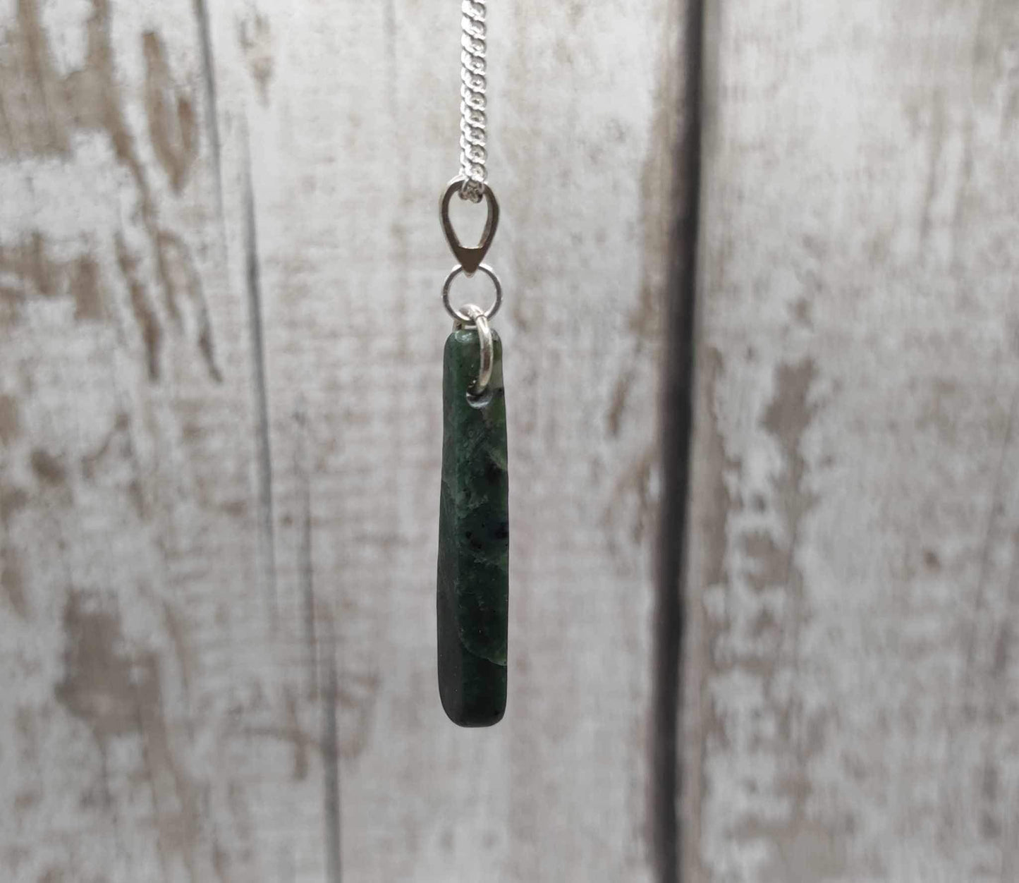 New Zealand Pounamu Greenstone serpentine, roimata drop on silver pendant.