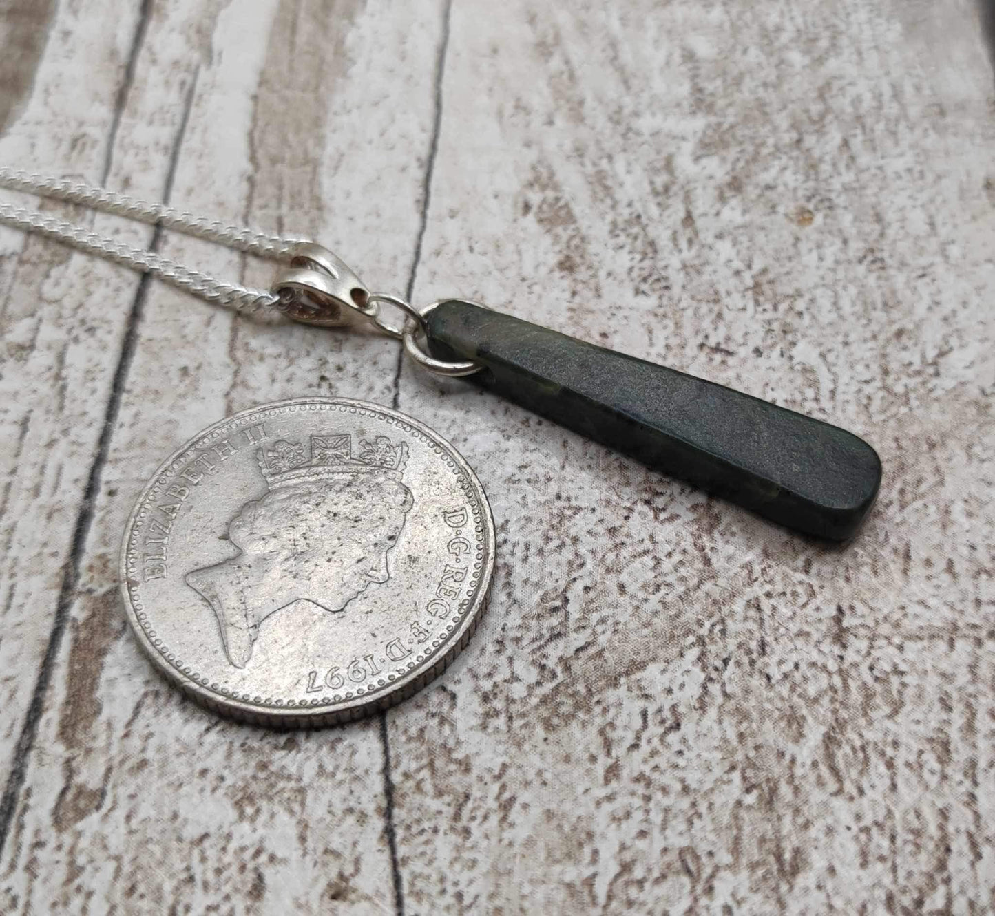 New Zealand Pounamu Greenstone serpentine, roimata drop on silver pendant.