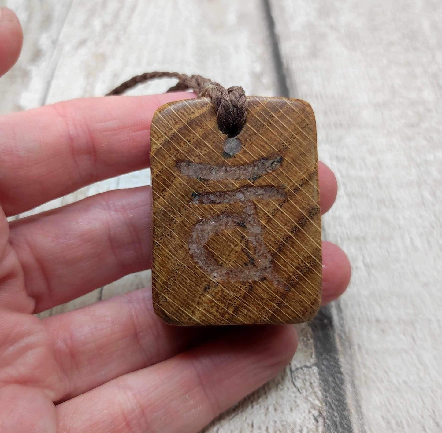 Oak wood sacral chakra and sunstone inlay.