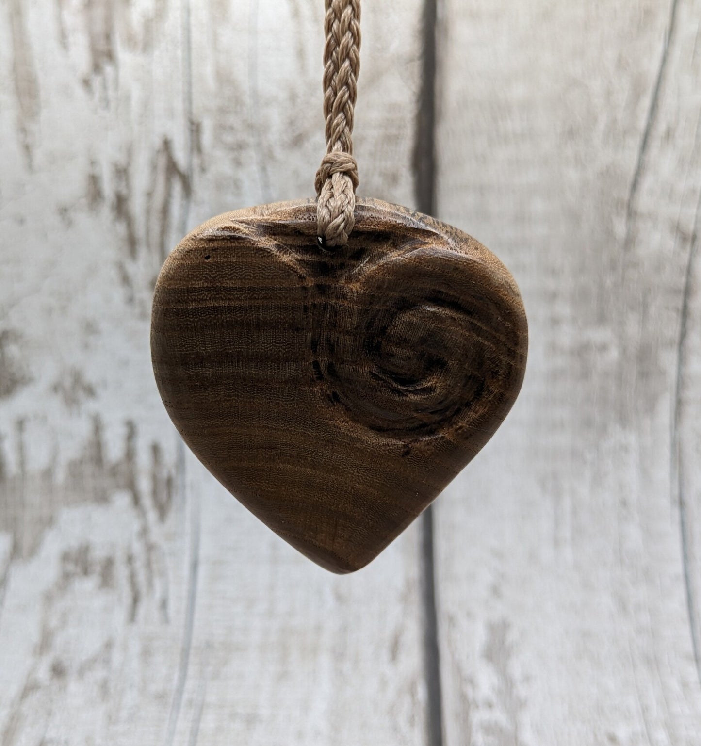 Birch wood Koru heart carved pendant.