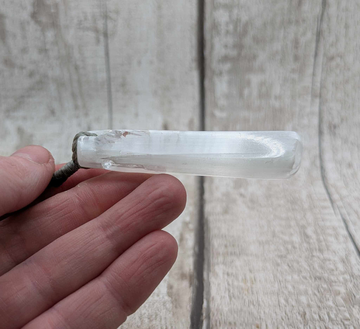 Selenite satin spar roimata pendant.