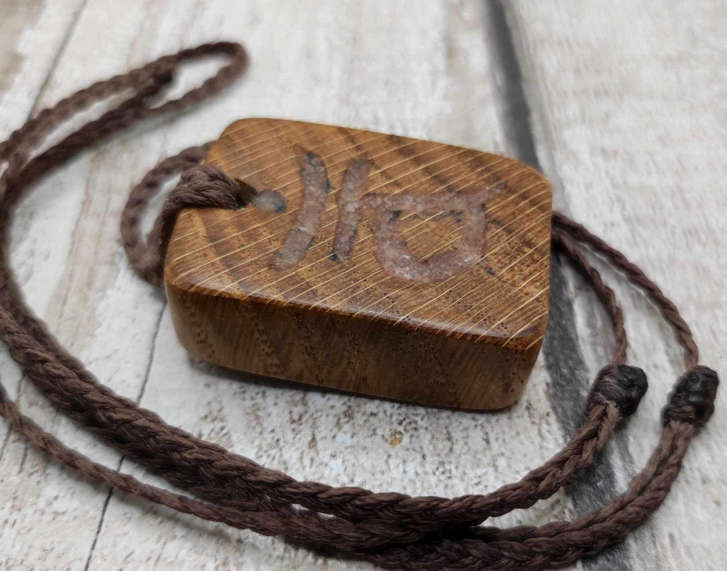 Oak wood sacral chakra and sunstone inlay.