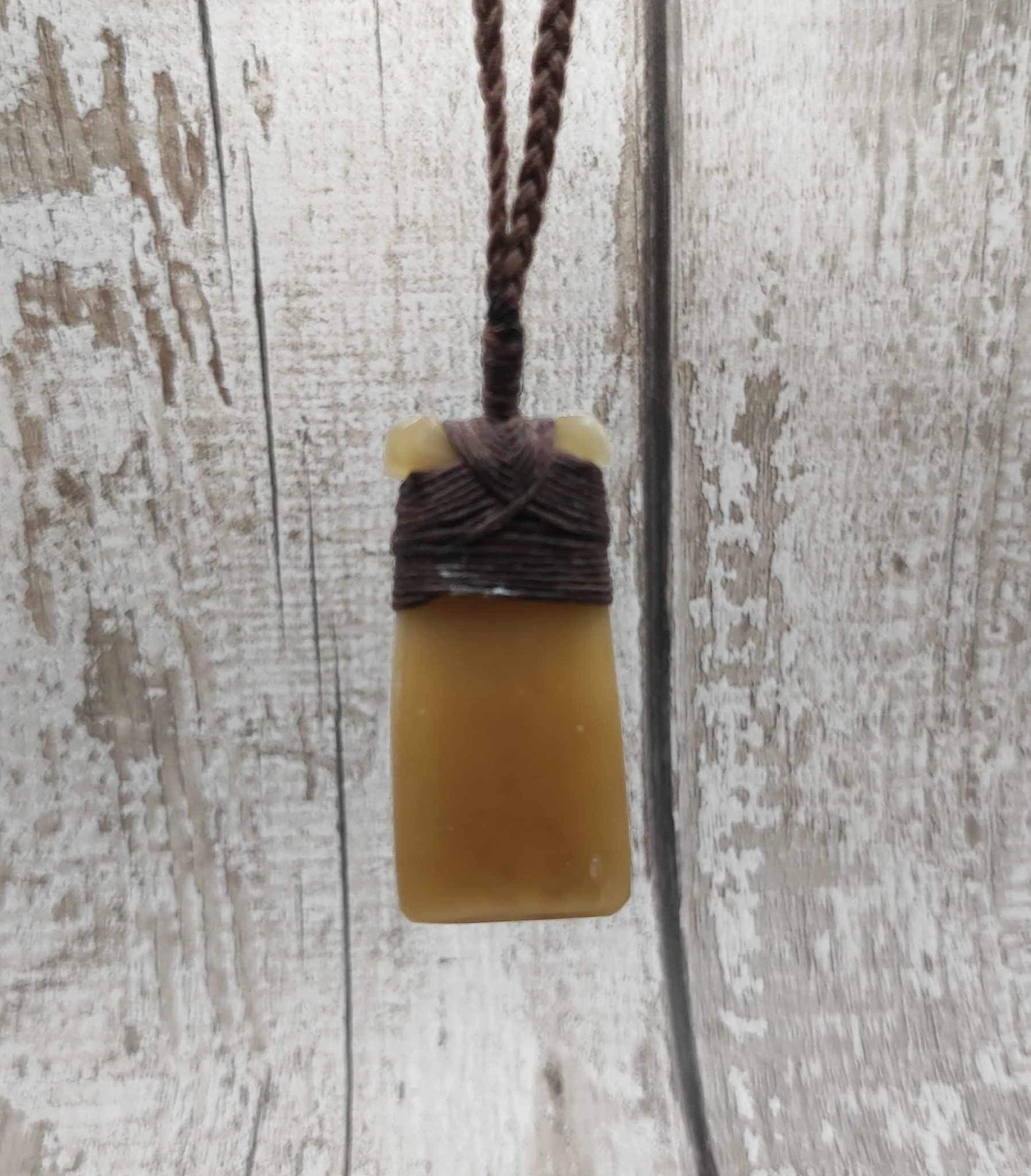 Cow horn Hei Toki adze unisex pendant.