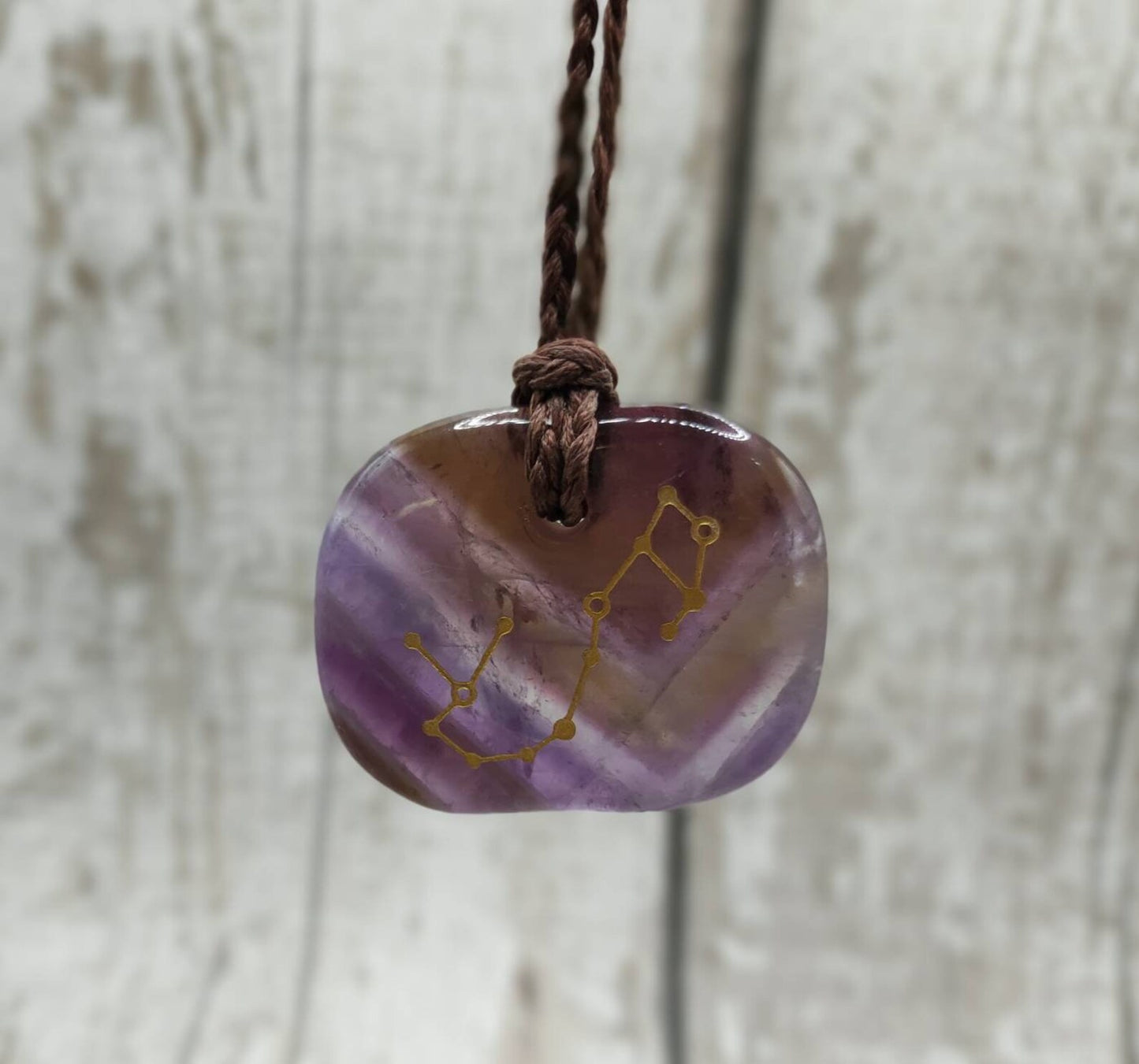 Amethyst star sign astrology, Pisces palm stone pendant.