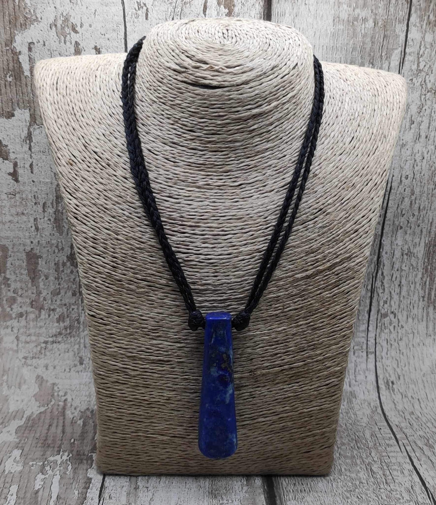 Lapis lazuli roimata drop stone pendant.