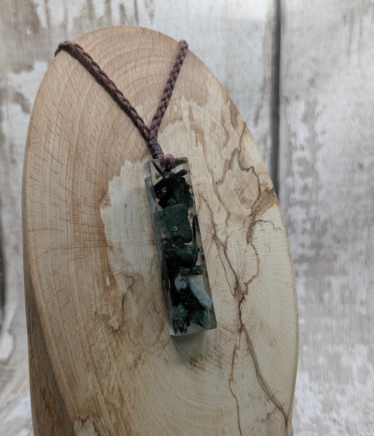 New Zealand mixed Pounamu chip pendant in UV resin.
