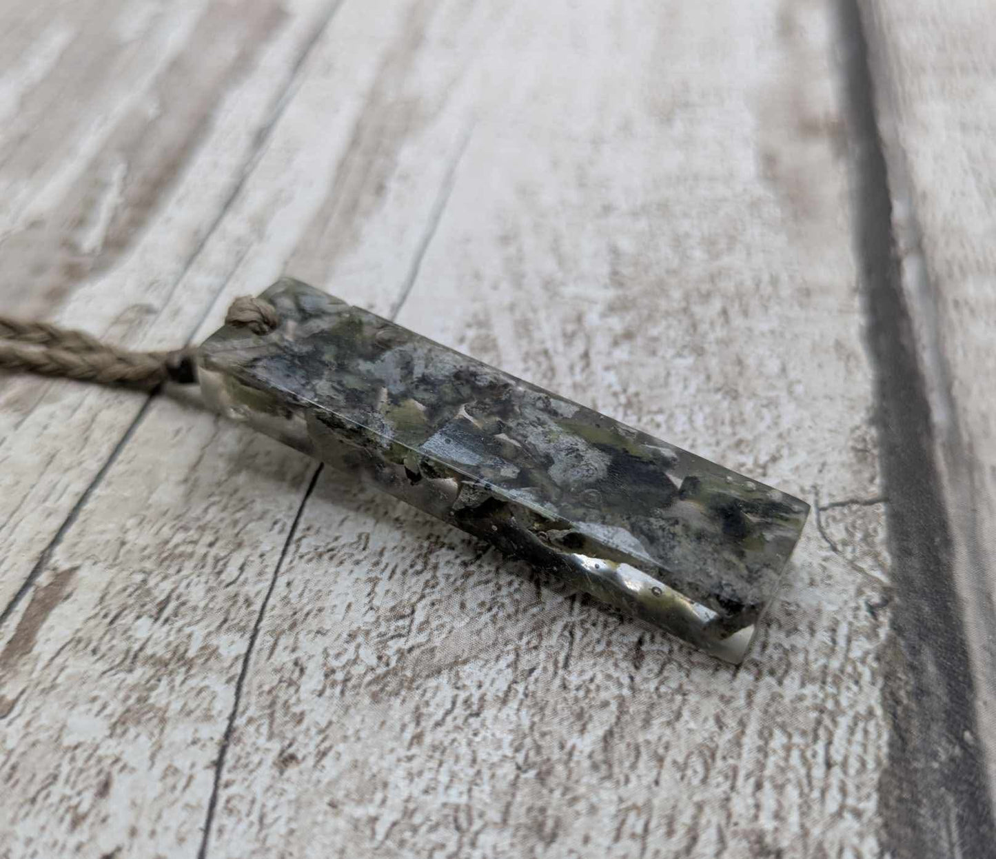 New Zealand mixed Pounamu chips pendant in UV resin.