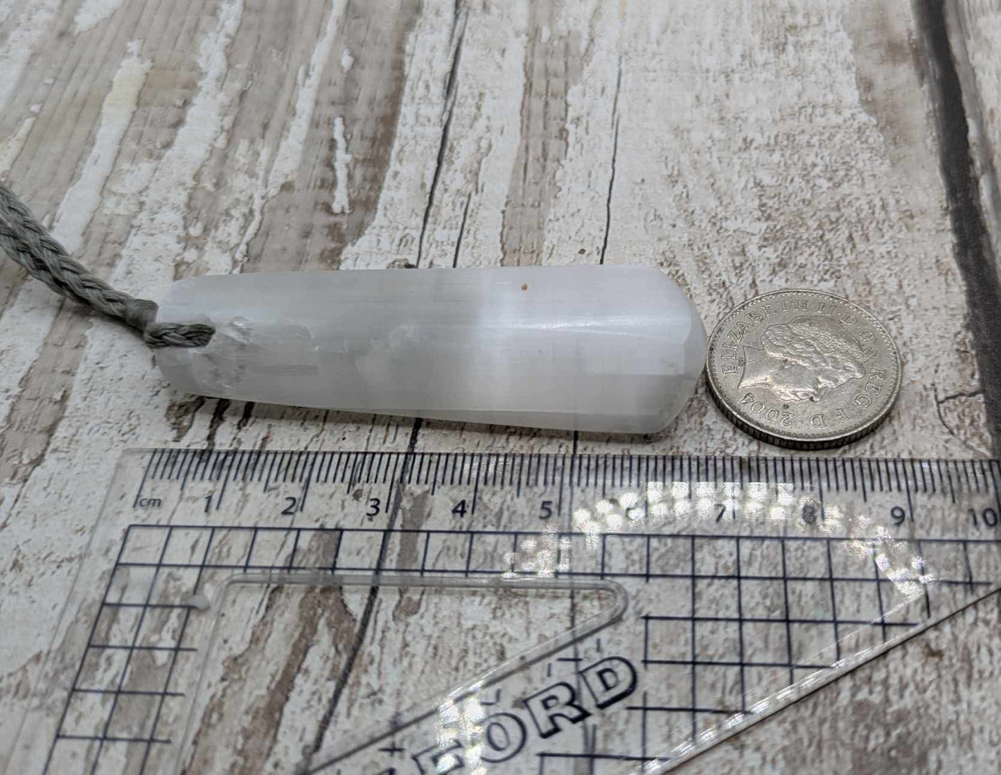 Selenite satin spar roimata pendant.