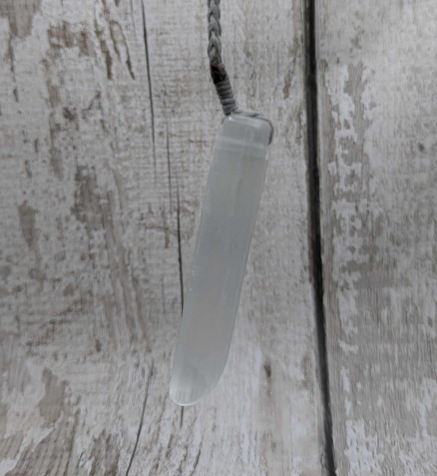 Selenite satin spar Toki pendant.