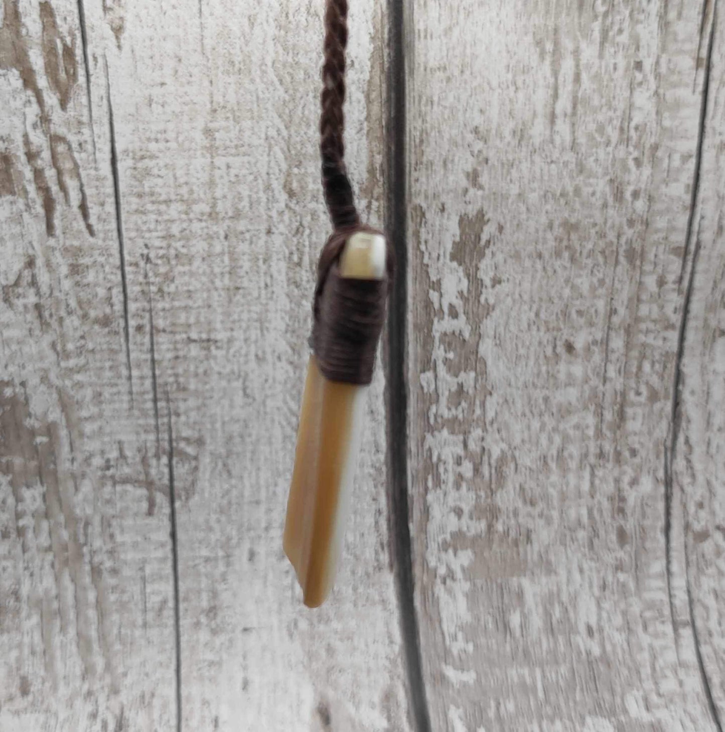 Cow horn Hei Toki adze unisex pendant.