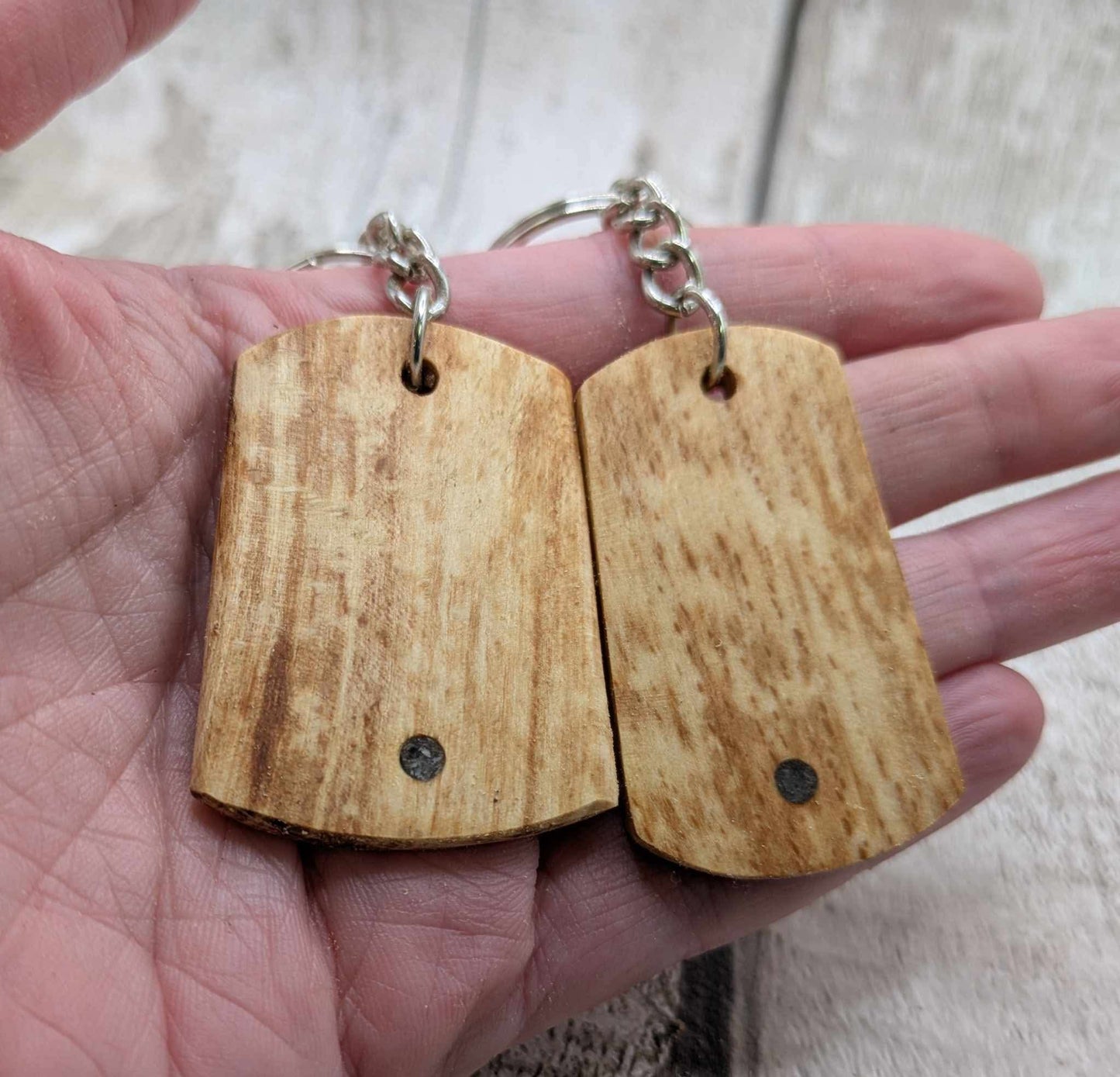 Beech wood keyrings and blue kyanite inlay.