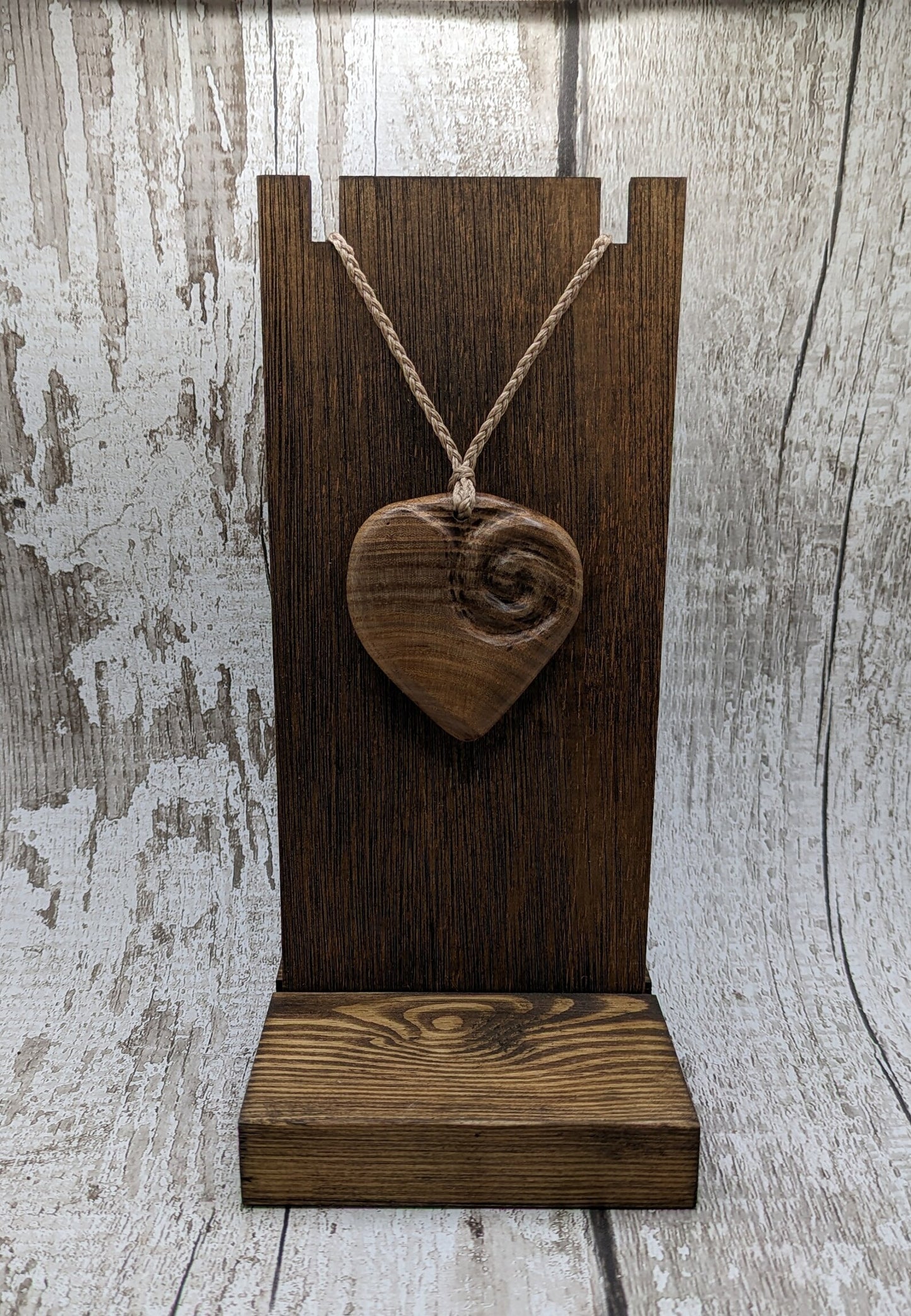 Birch wood Koru heart carved pendant.
