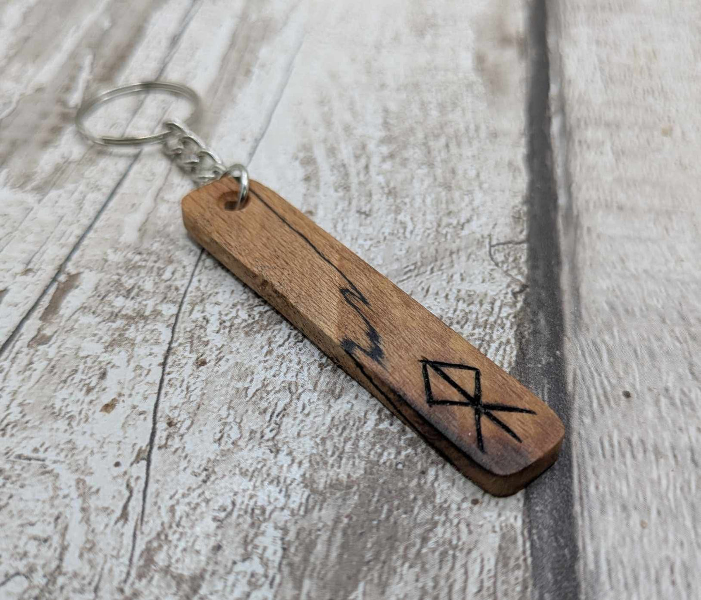 Spalted beech protection bind run keyrings.
