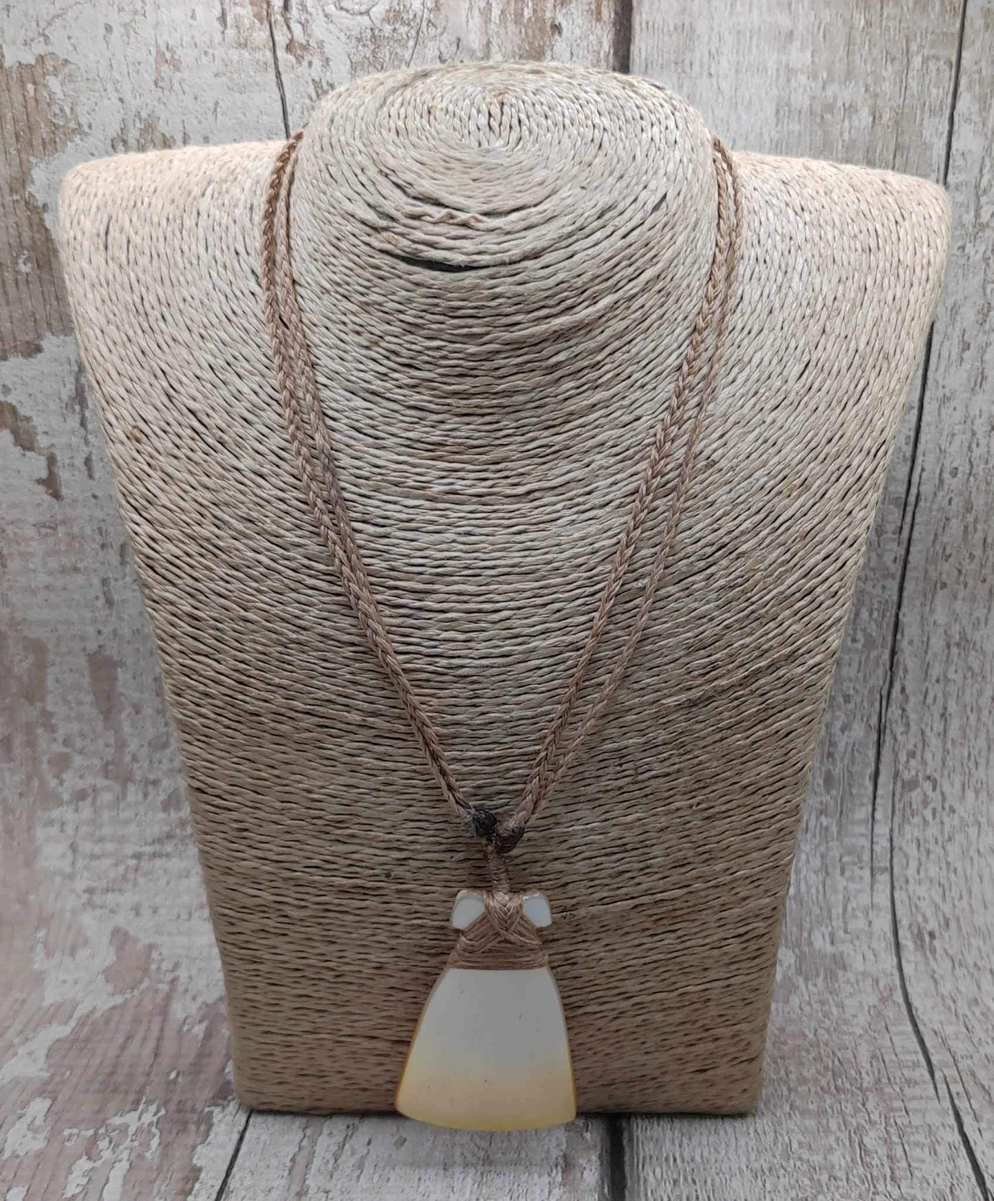 Mother of Pearl Hei Toki adze pendant.