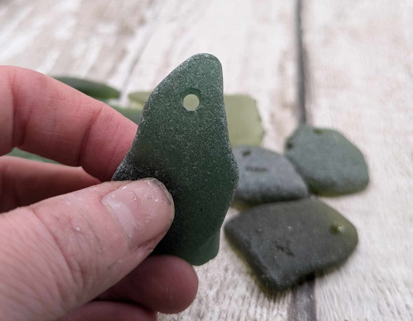 Green sea glass top drilled beads.