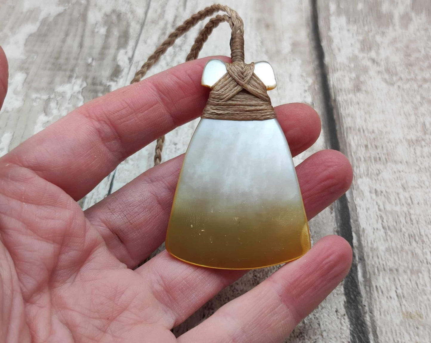Mother of Pearl Hei Toki adze pendant.