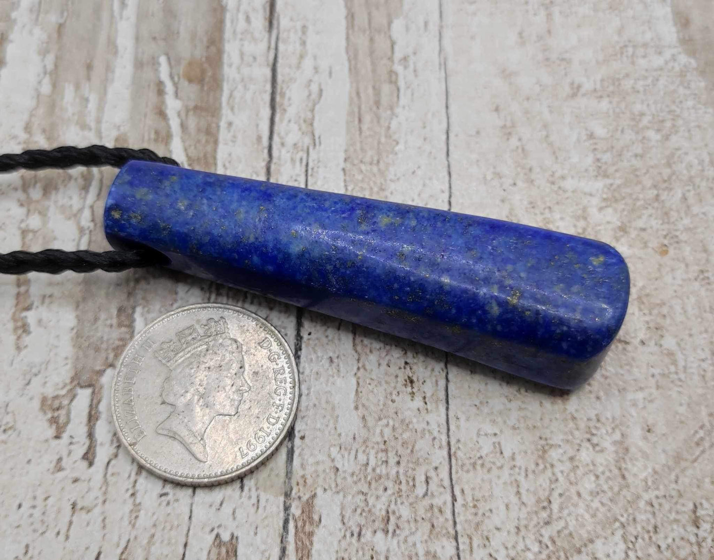 Lapis lazuli roimata drop stone pendant.