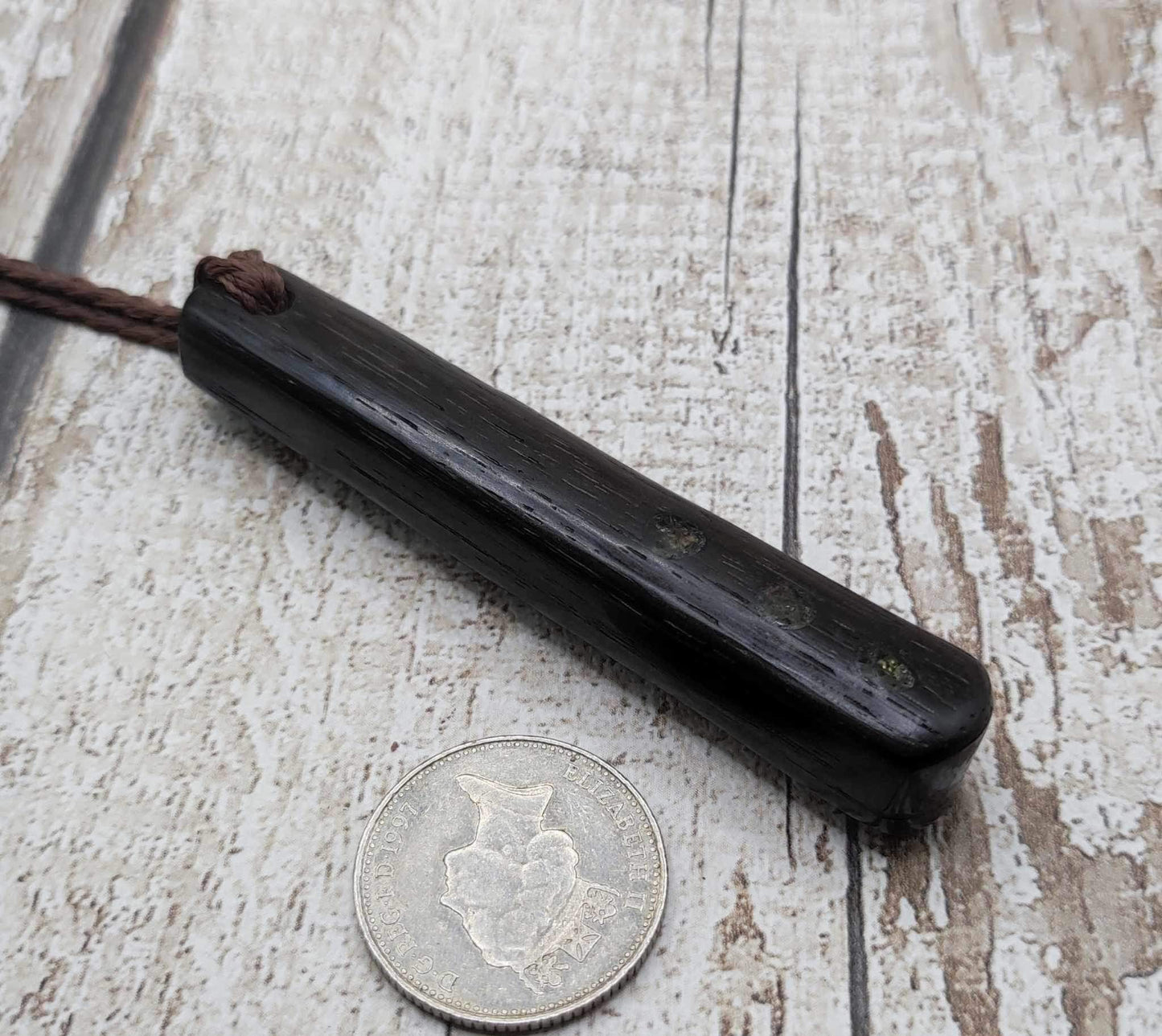Bog oak + moldavite roimata carved pendant.