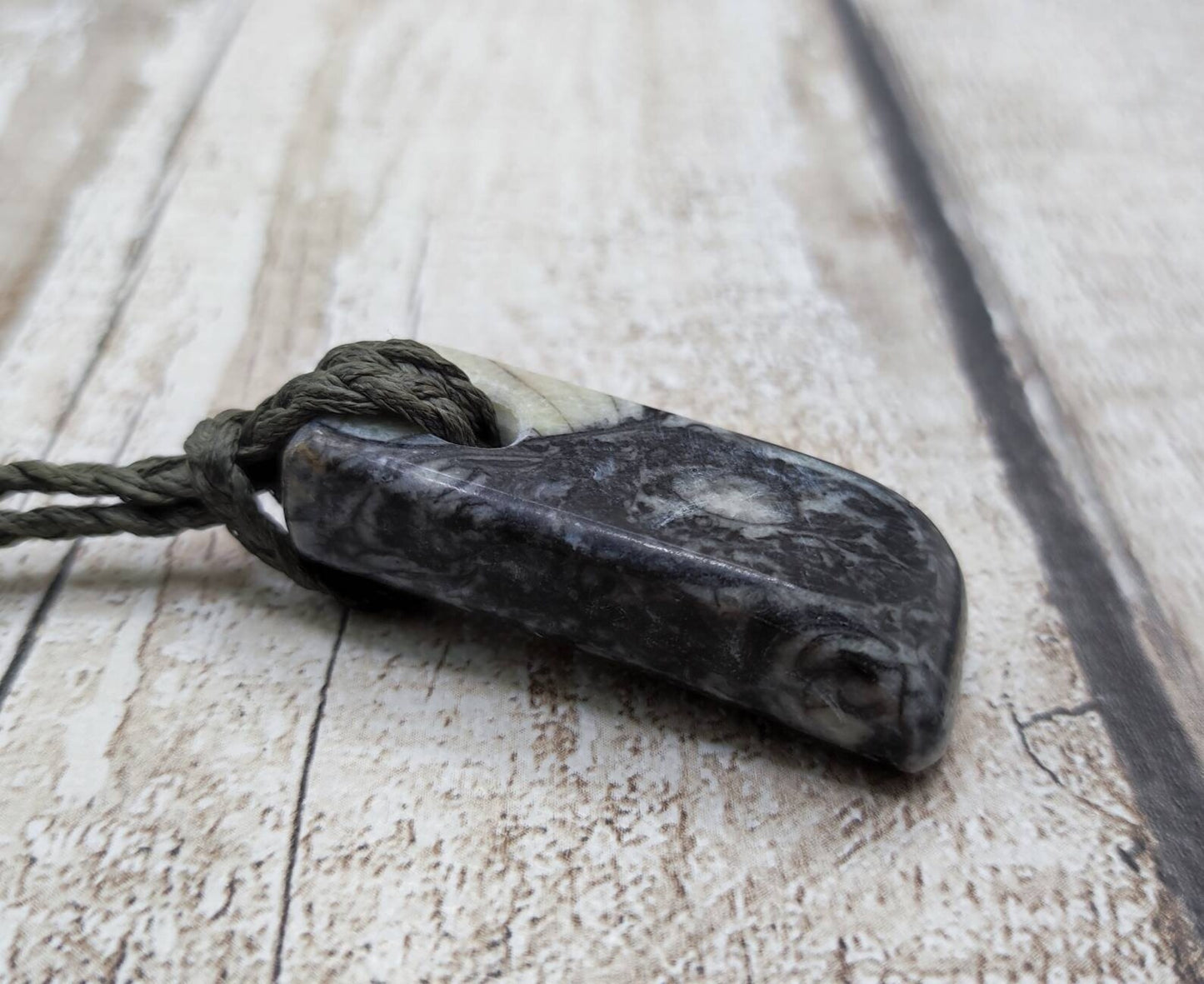 Fossil bedrock Hei Toki adze pendant
