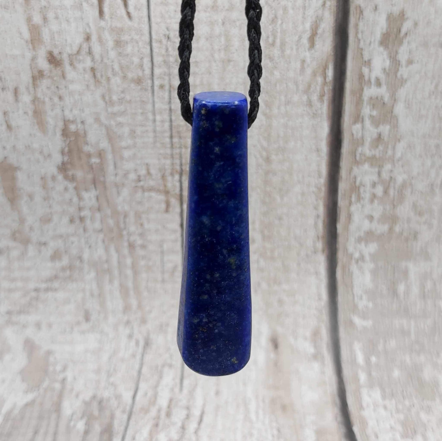 Lapis lazuli roimata drop stone pendant.