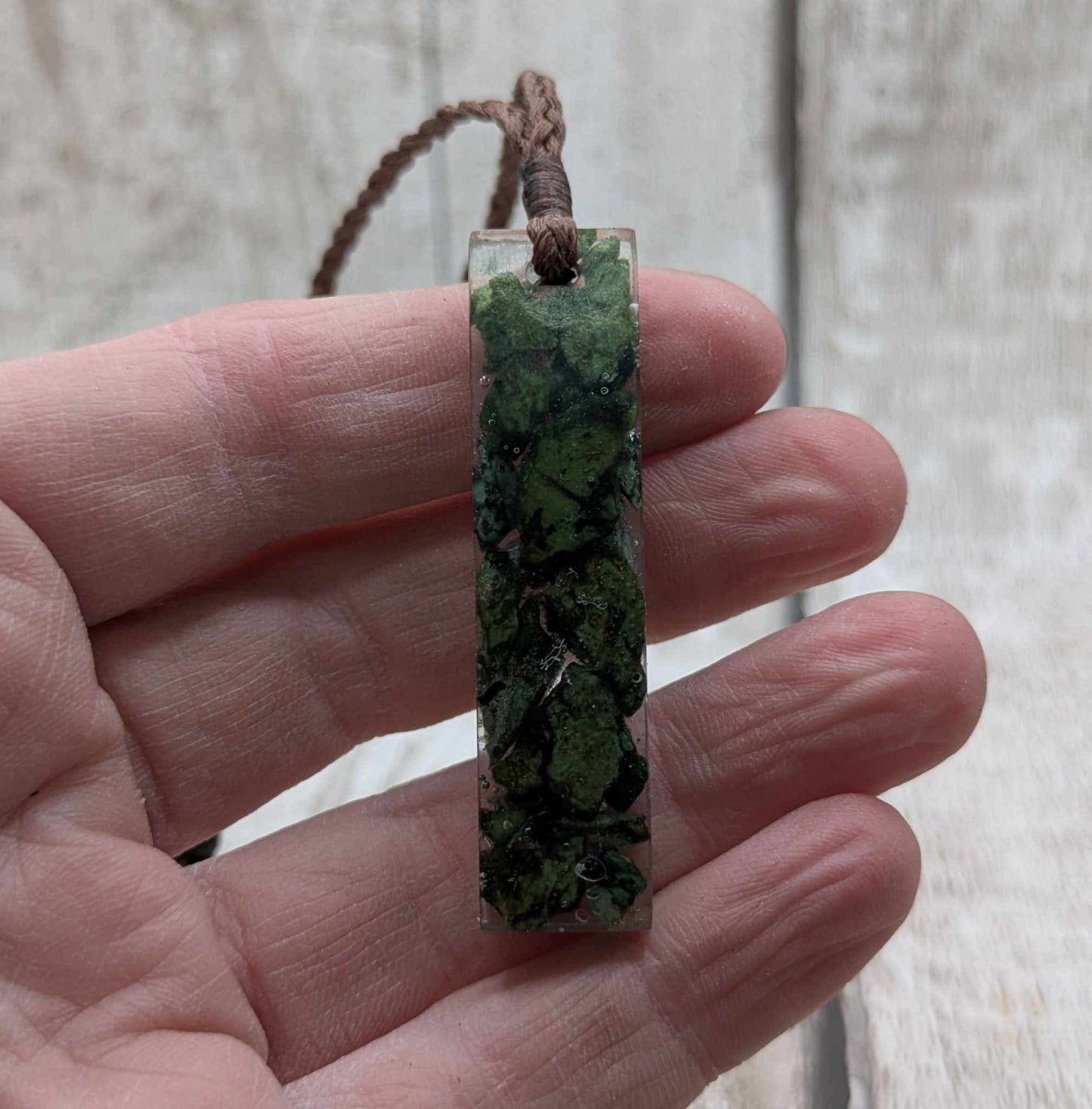 New Zealand mixed Pounamu greenstone chip pendant in UV resin.