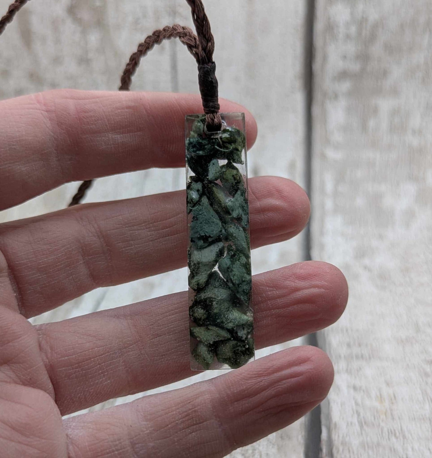New Zealand mixed Pounamu greenstone chip pendant in UV resin.