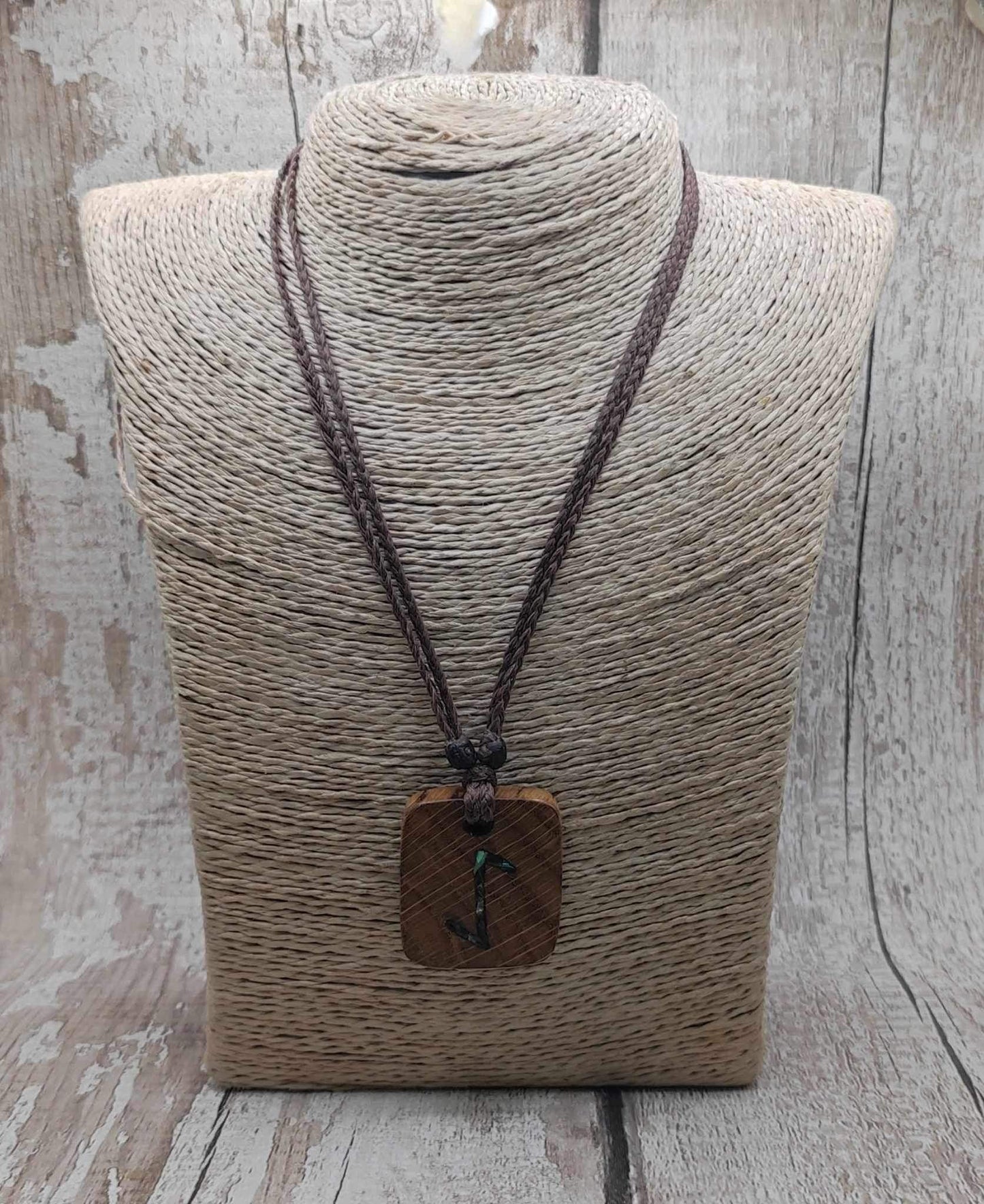 Eihwaz oak wood rune pendant with Pāua shell inlay.