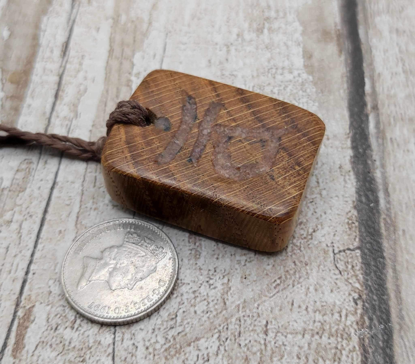 Oak wood sacral chakra and sunstone inlay.