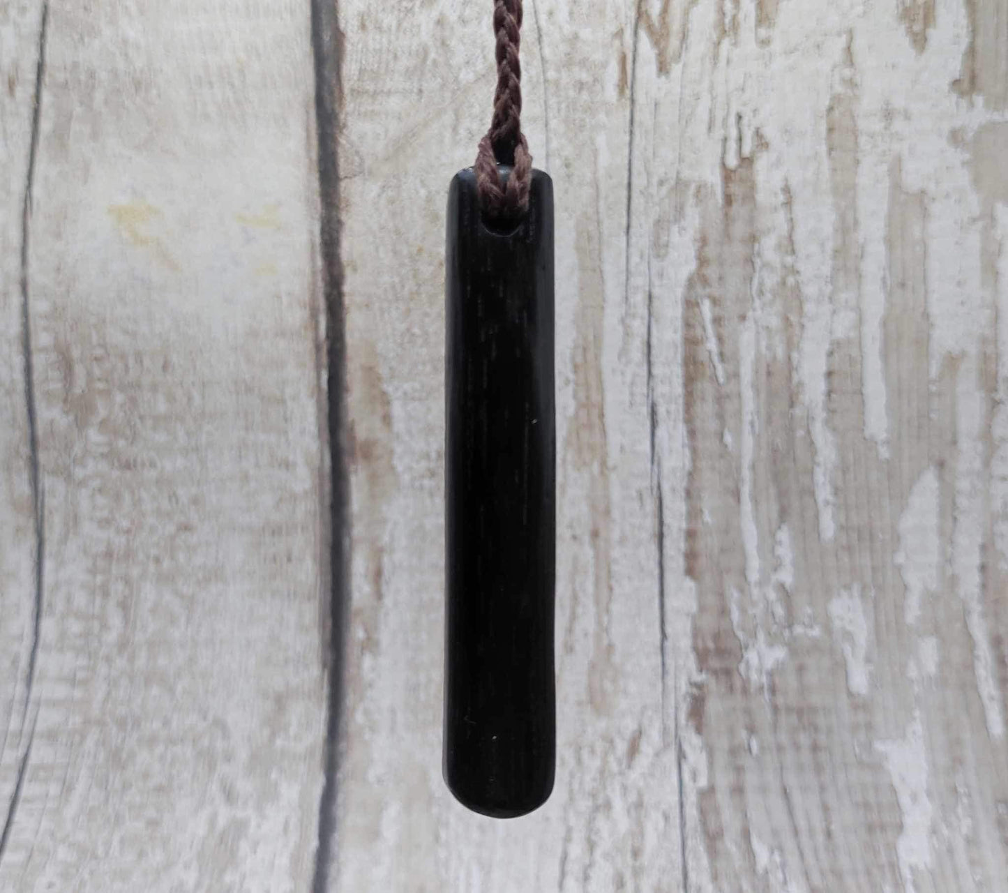 Bog oak + moldavite roimata carved pendant.