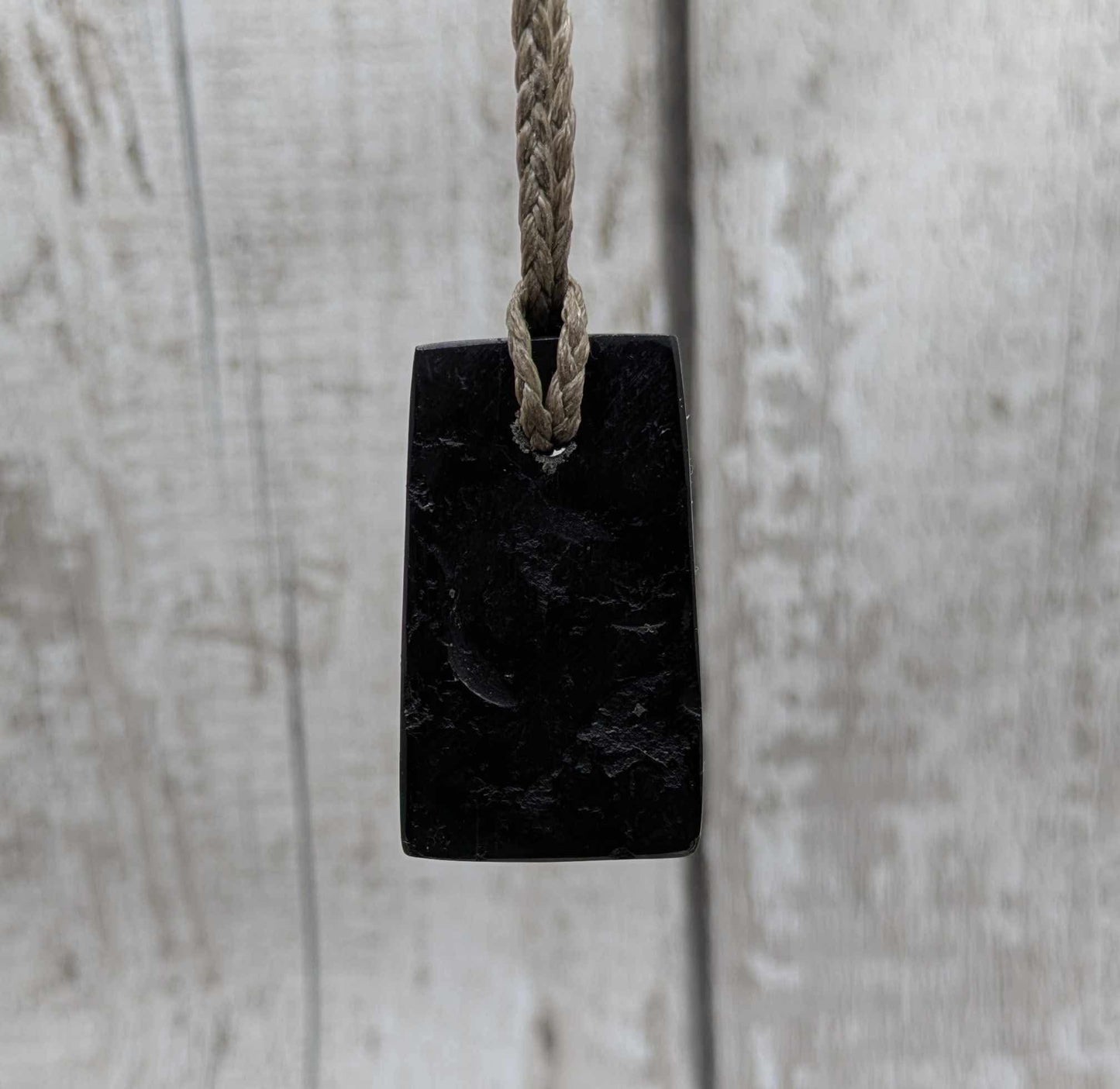 Sea coal rectangular pendant.