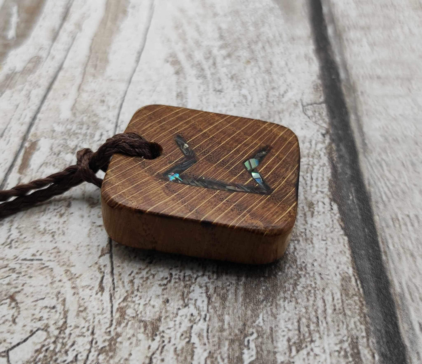 Perthro oak wood rune Christmas decoration with Pāua shell inlay.