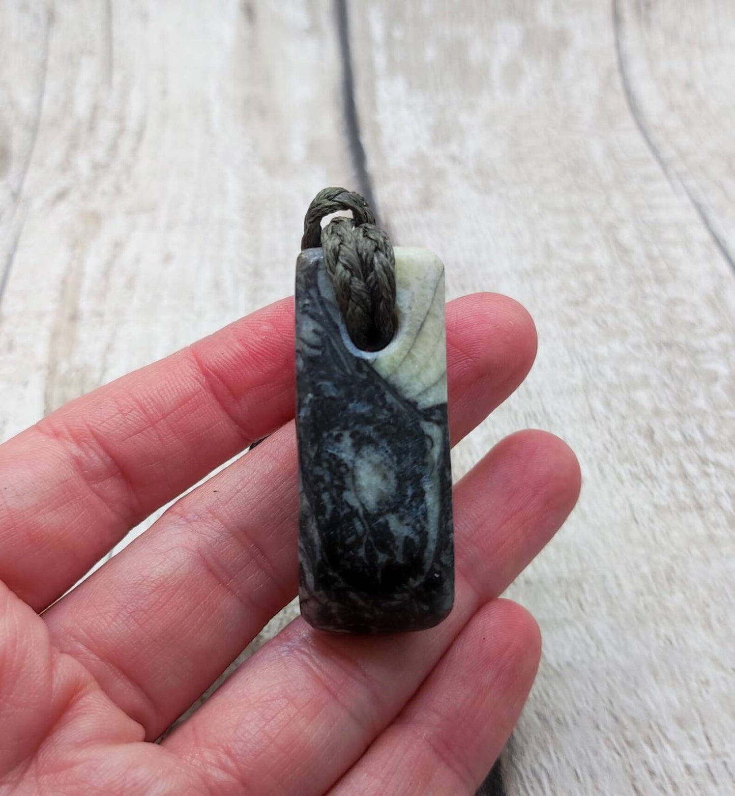 Fossil bedrock Hei Toki adze pendant